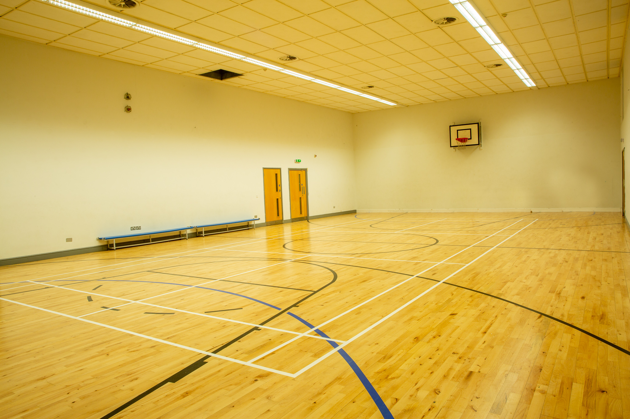 Holland Park School indoor sports hall, empty gymnasium venue for events and conferences.