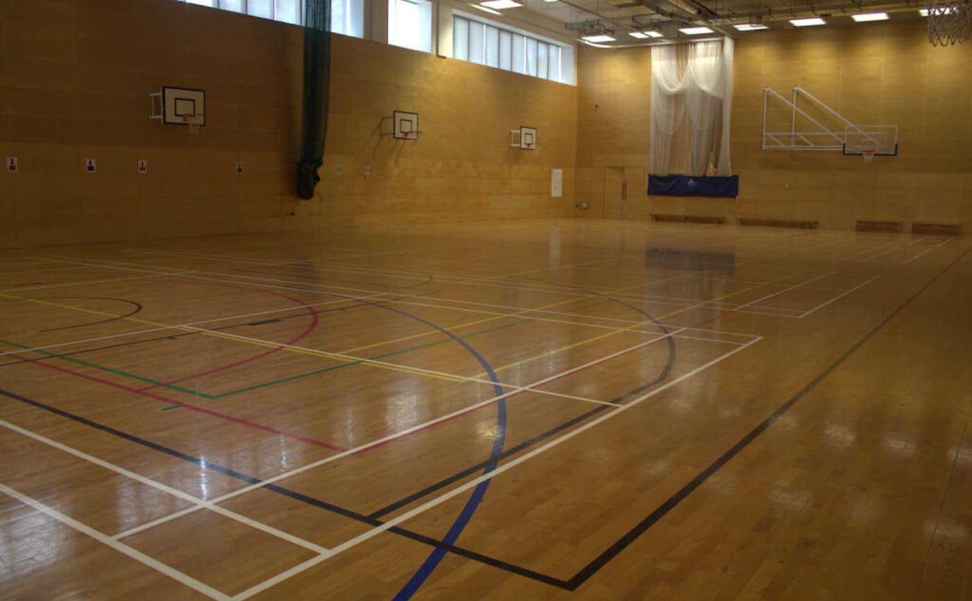 Indoor Sports Hall at Holland Park School: blank-canvas event venue and sports facility space.