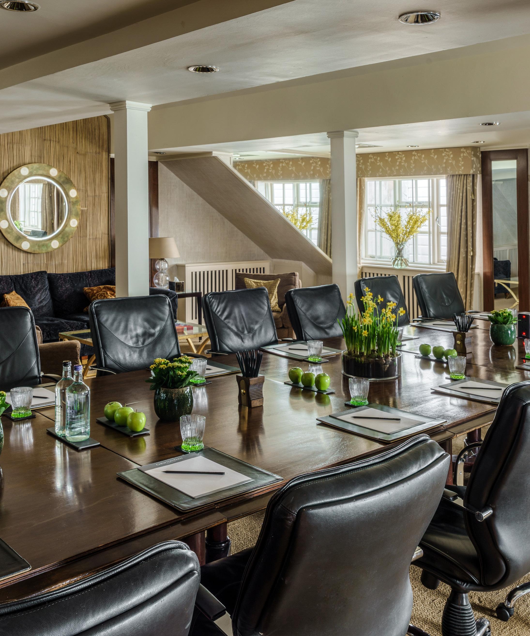 Executive boardroom at Chewton Glen Hotel: classic meeting space with leather seating.