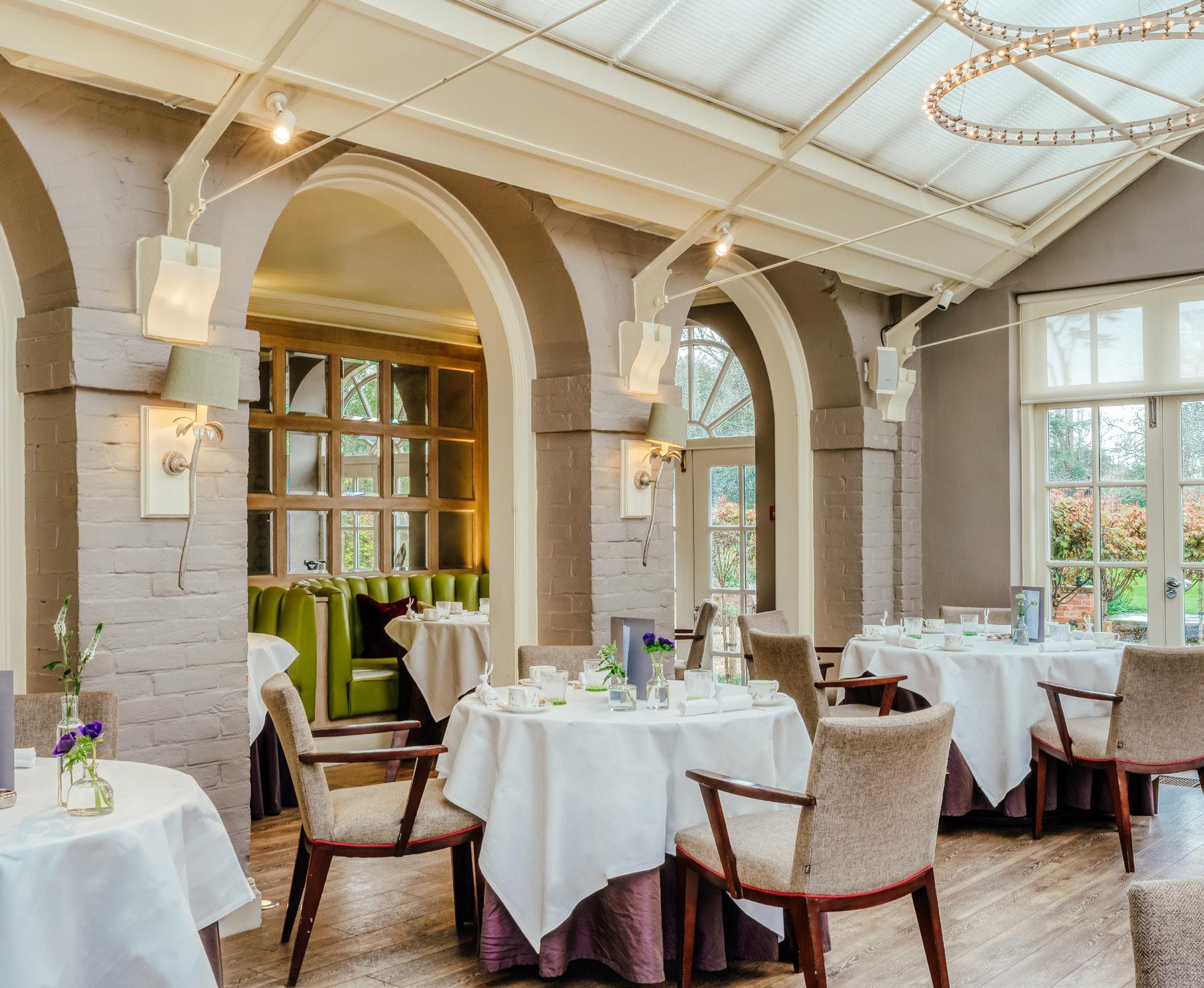 Ward Room conservatory with architectural arches for luxury private dining and networking events.