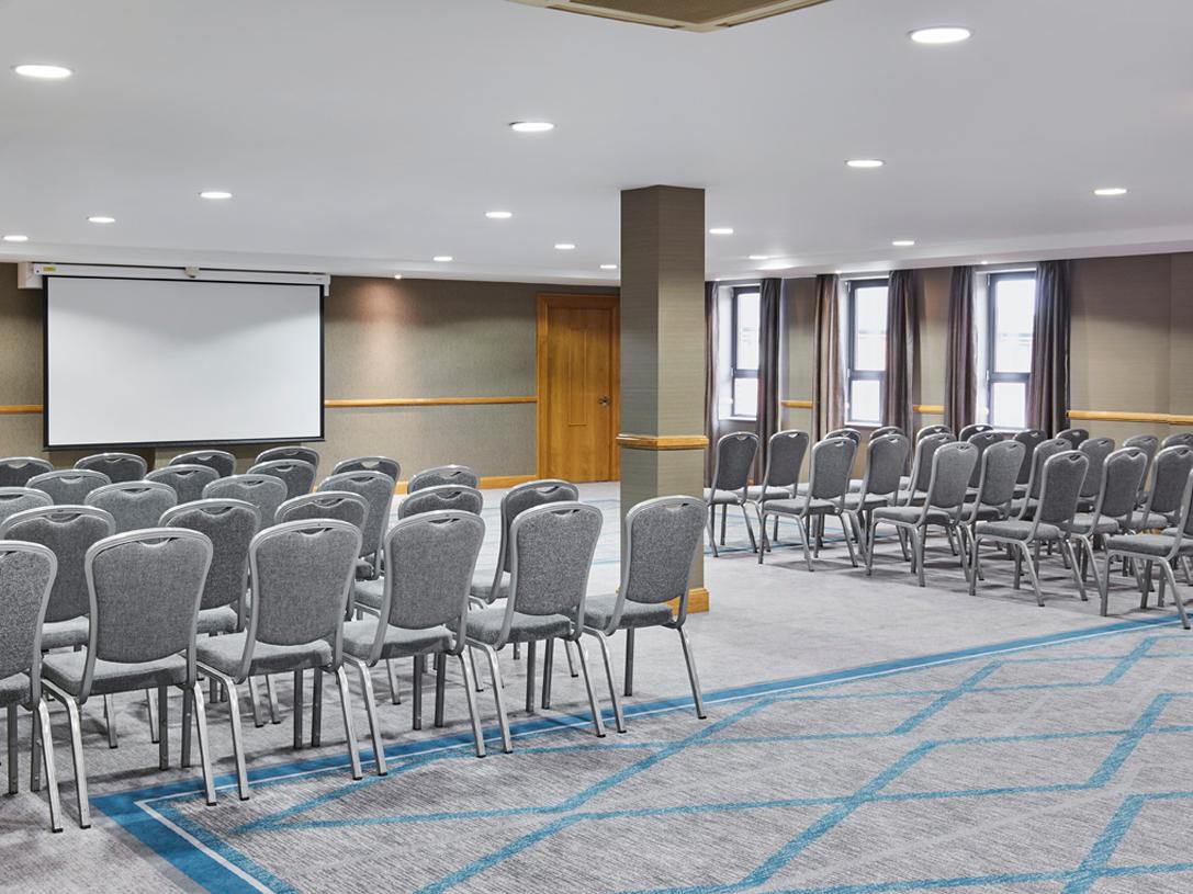 Crowne Plaza Belfast Grand Ballroom: theater-style meeting room for corporate training events.