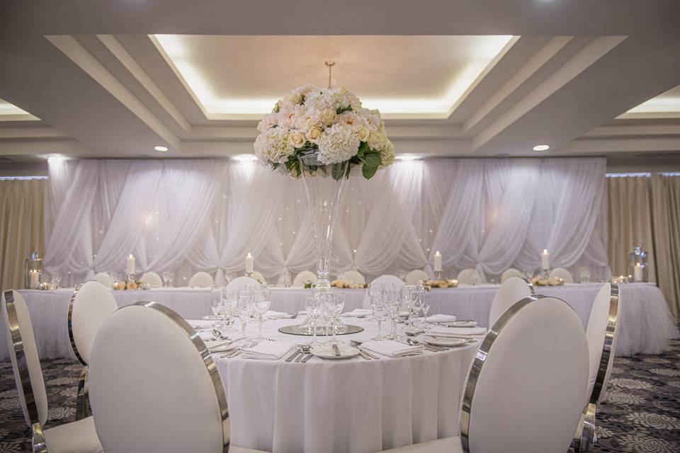 Laganview Suite gala setup with floral centerpiece for upscale formal events and weddings.