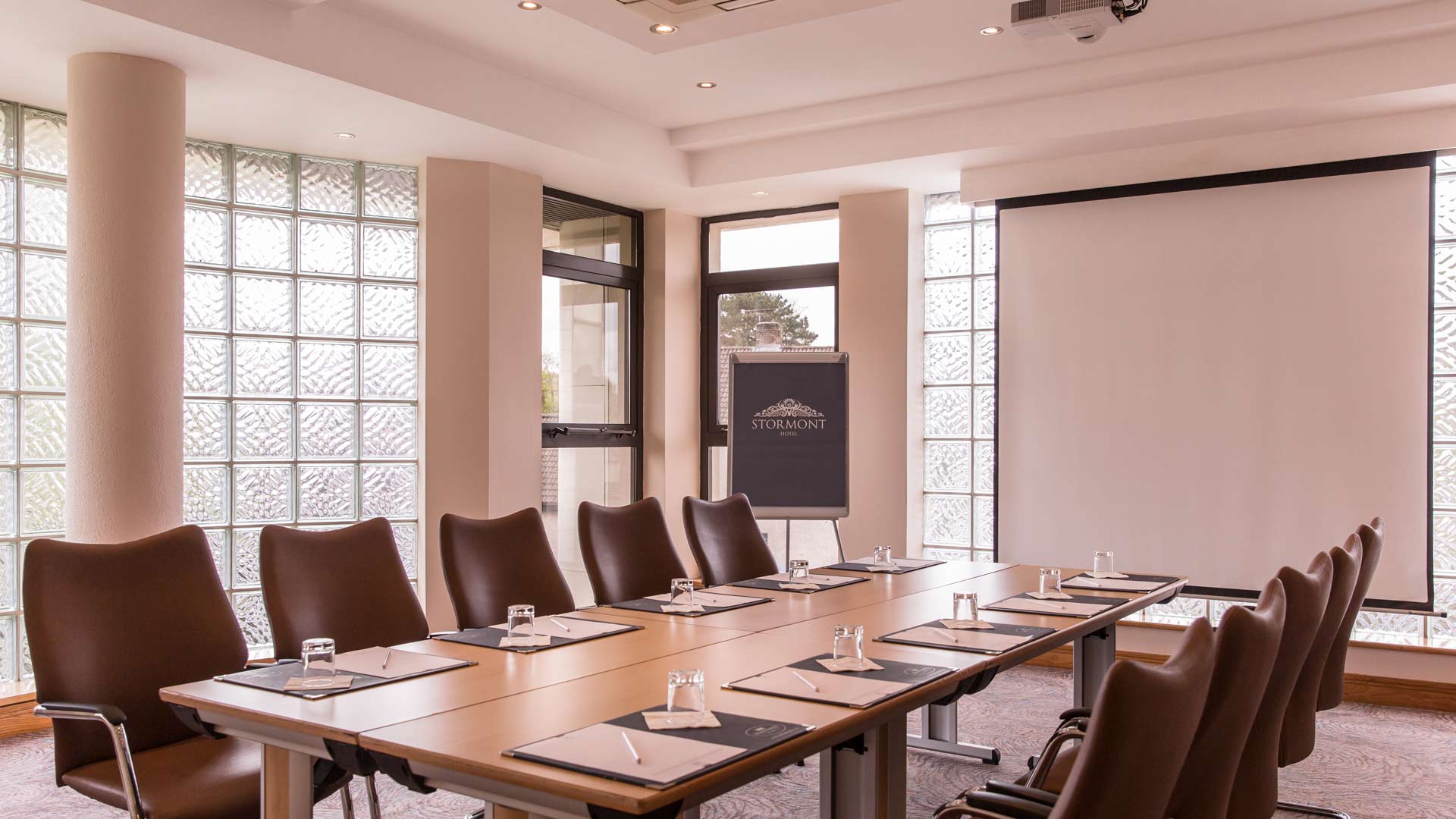 Dunmisk Suite boardroom with leather chairs, ideal for professional corporate meetings and events.