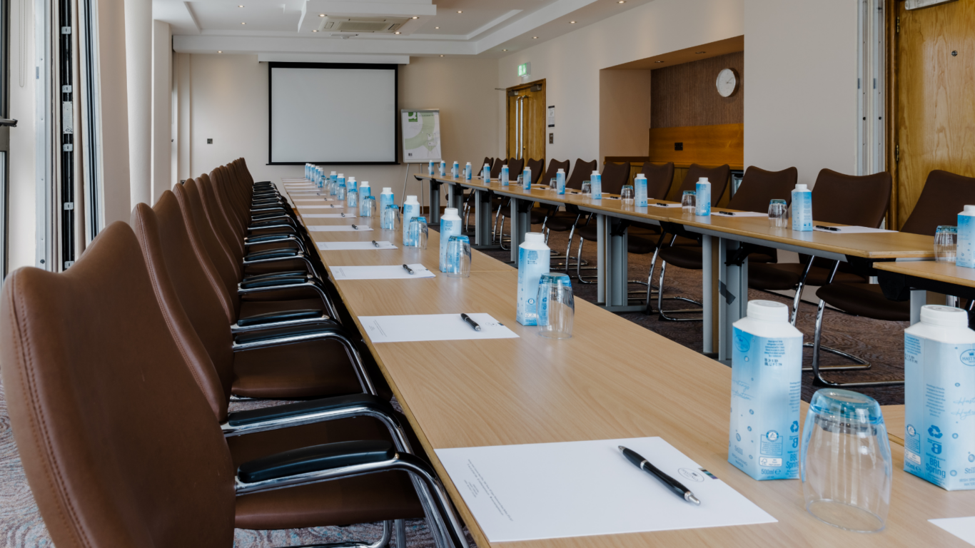 Boardroom-style setup in Stormont Hotel Dunmisk Suite for corporate workshops and meetings.