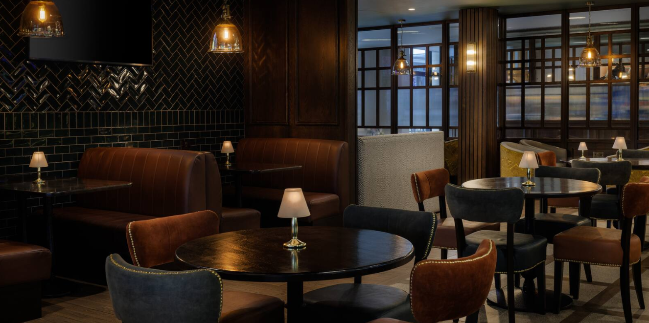 Kingfisher Suite at Doubletree Belfast: atmospheric venue for networking and breakout sessions.