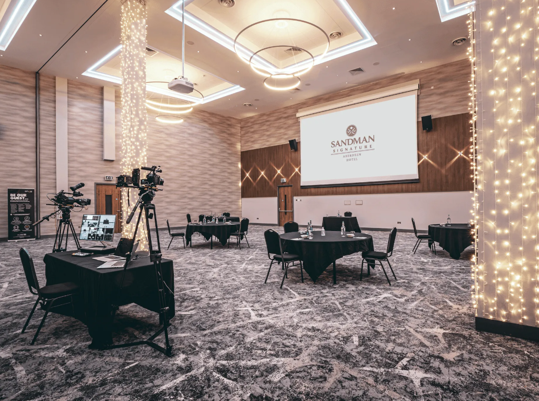 Robert Gordon Ballroom with AV setup for corporate meetings and social events.