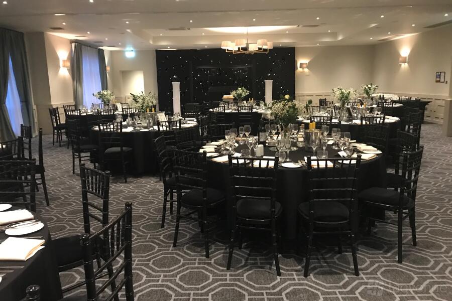 Stephenson Suite gala setup with starry backdrop for corporate events and formal dinners.