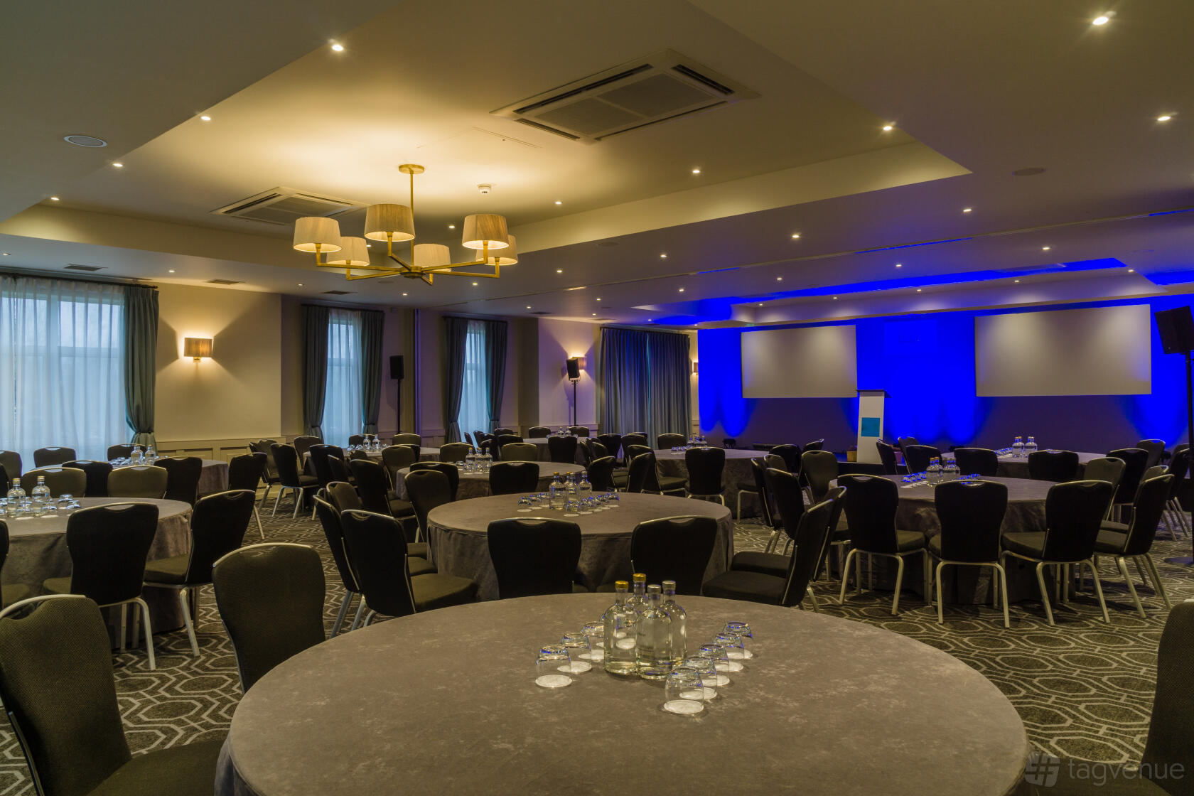 Baird Suite ballroom with LED lighting, set for a gala banquet or corporate conference.