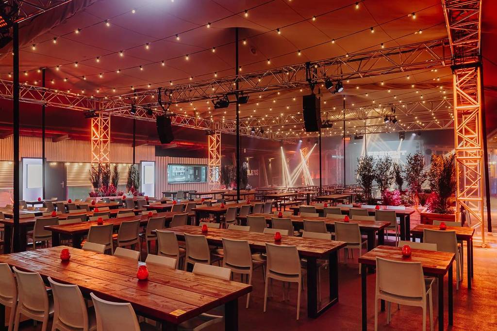 Industrial event space at The Ferndale featuring festoon lighting for corporate or social gatherings.