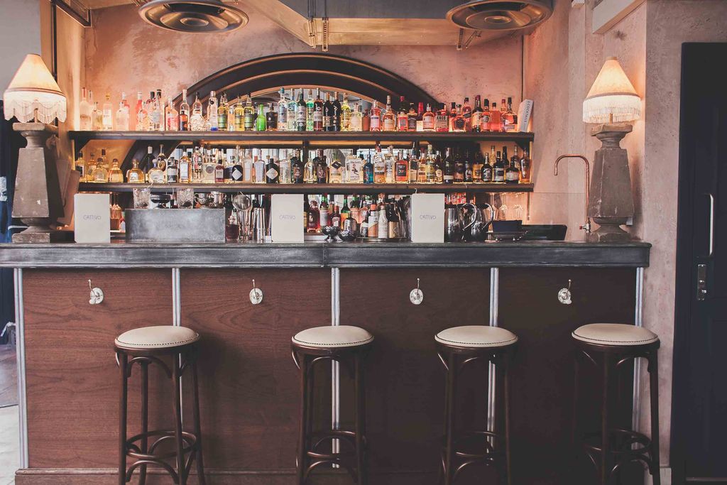 Main Bar at The Ferndale featuring an intimate, moody design for VIP receptions and networking.