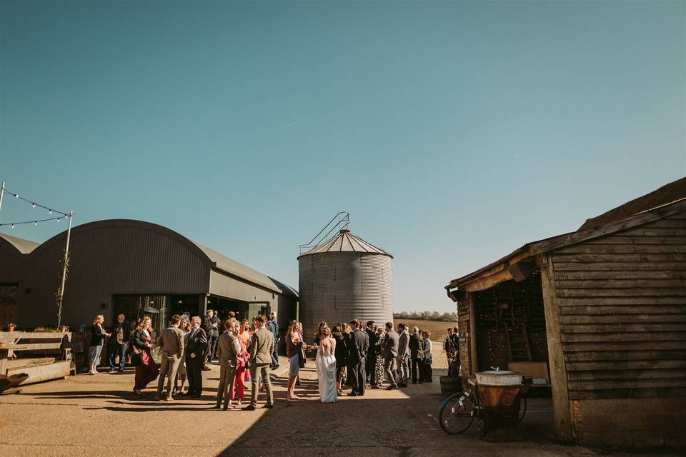 Rustic Granary barn venue for intimate outdoor wedding reception at The Barns at Lodge Farm.