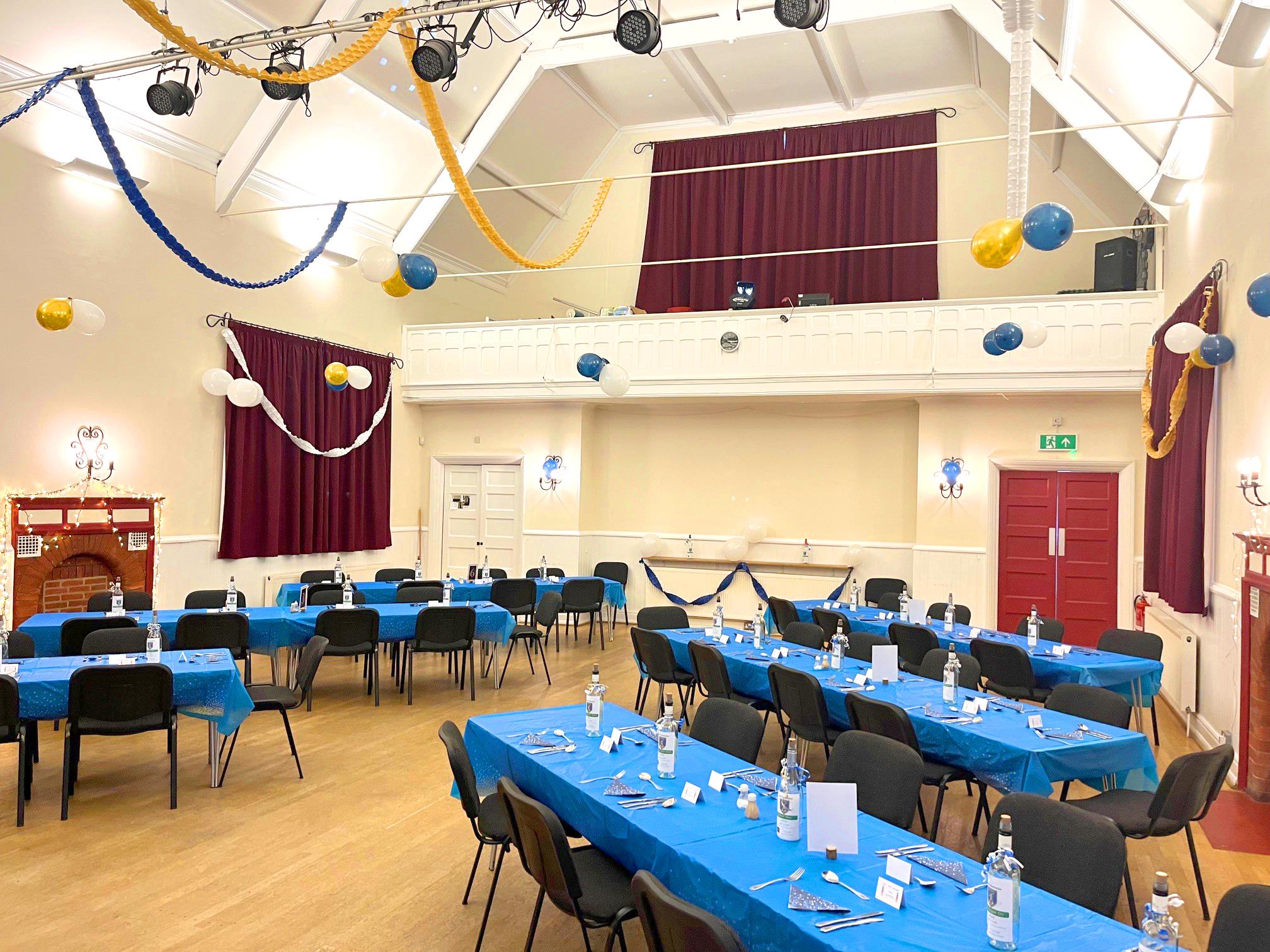 Main Training Room, banquet-style layout for community events and casual corporate gatherings.