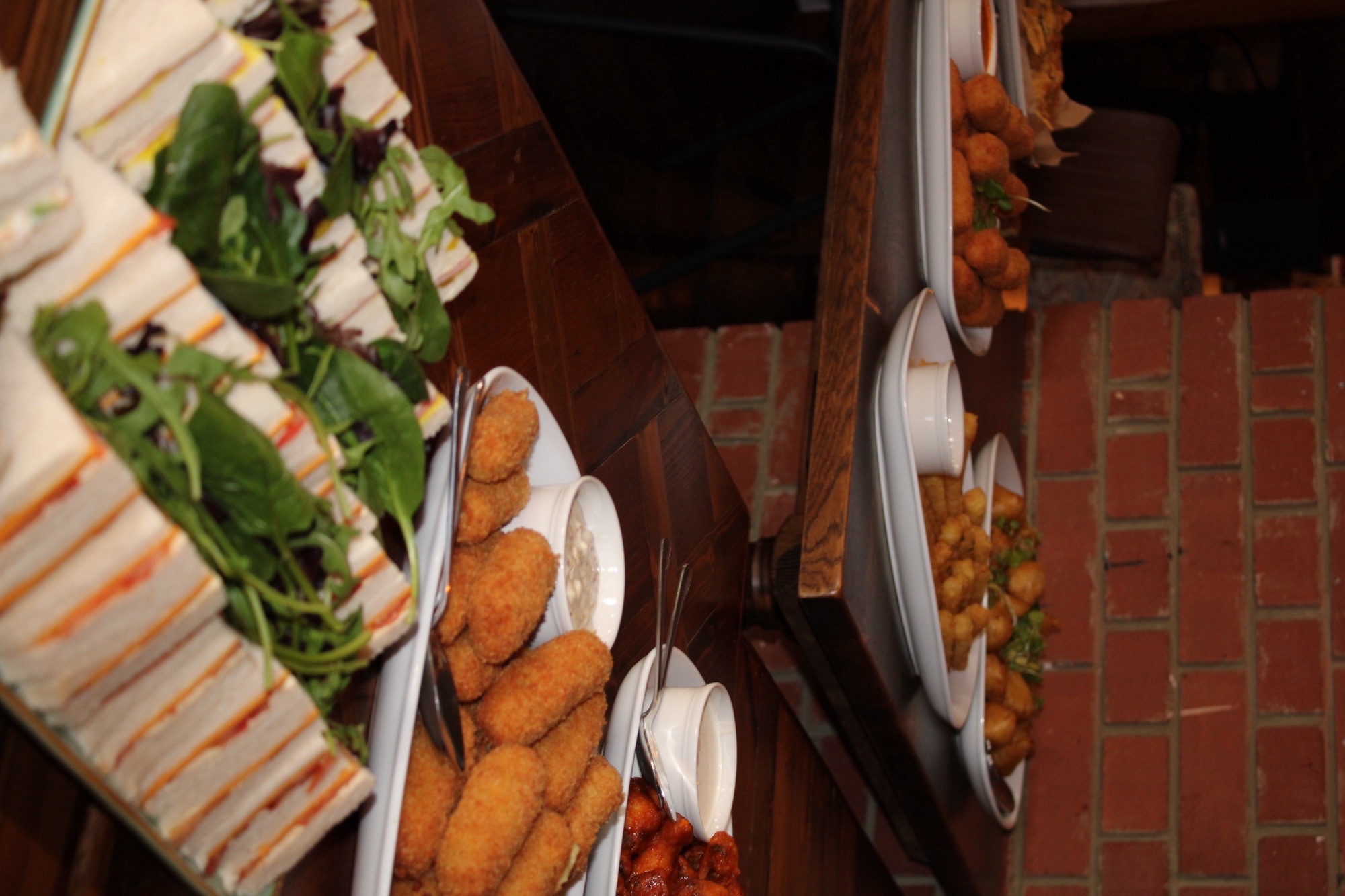 Casual networking reception at The Study, Eltham GPO, featuring shared platters for events.