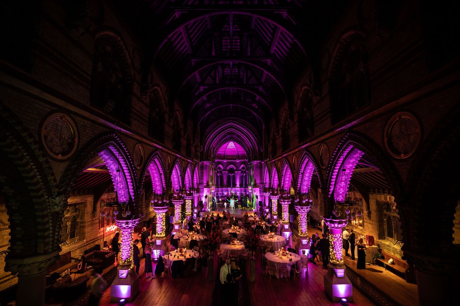 St Stephen's Hampstead Main Hall with purple uplighting for upscale gala or evening reception.