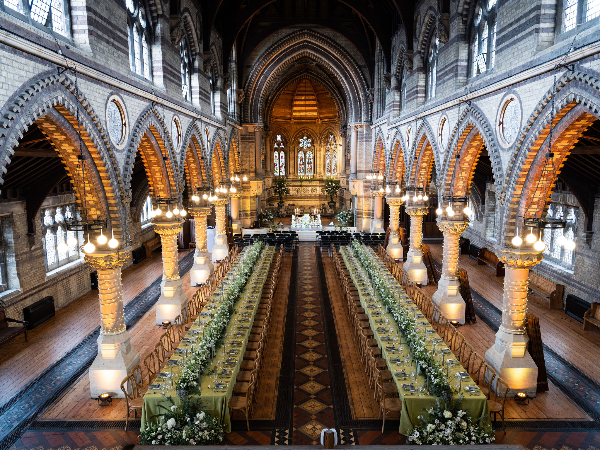 St Stephen's Hall banquet setup with vaulted architecture for upscale gala or wedding events.
