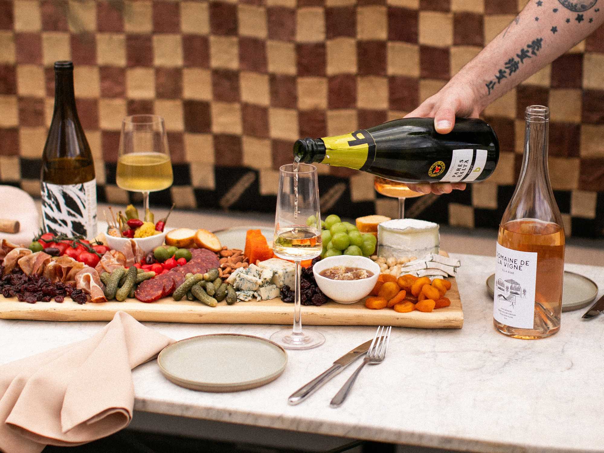 Charcuterie spread and wine for networking reception and VIP hospitality event.
