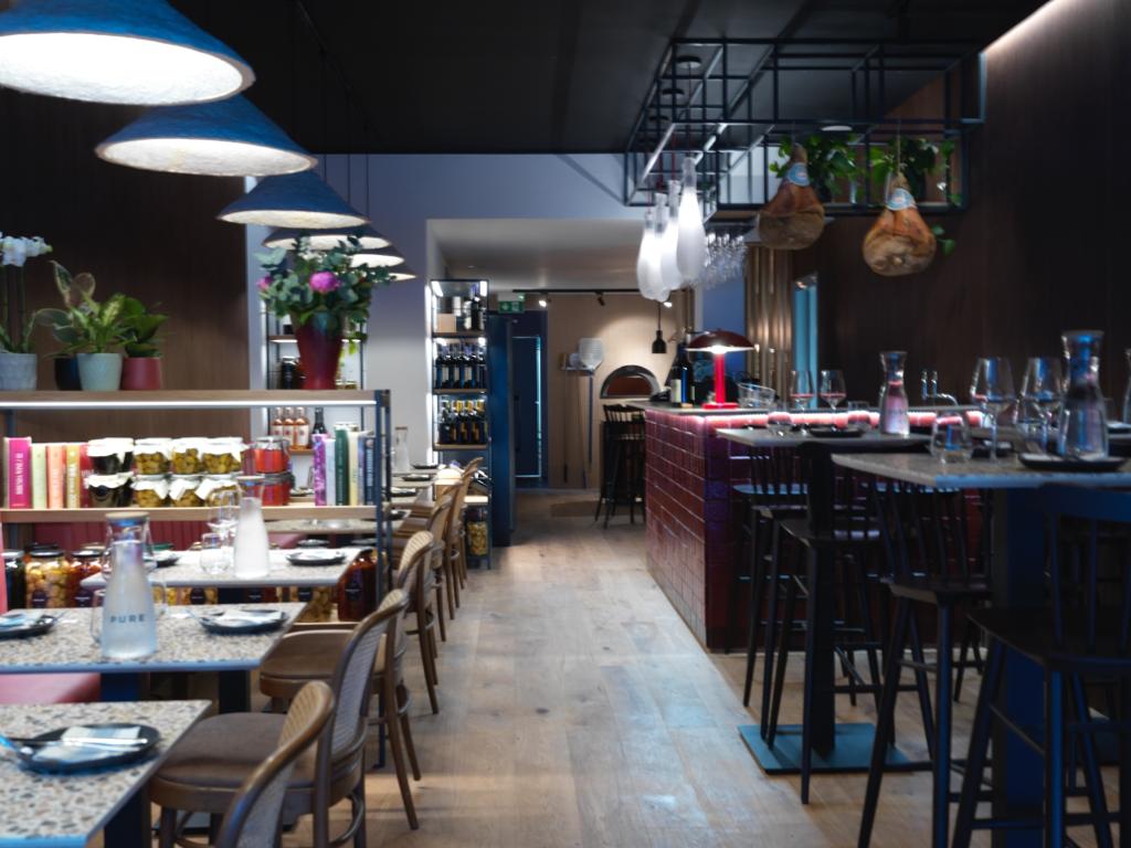 High-end Italian wine bar with banquet seating for corporate dinners and networking events.