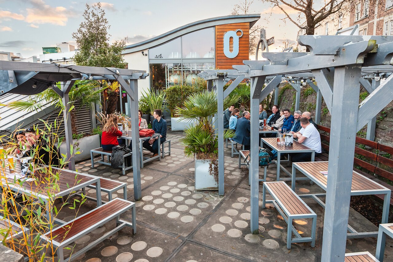 Tank Lounge & Terrace pergola for casual networking and outdoor corporate team building events.