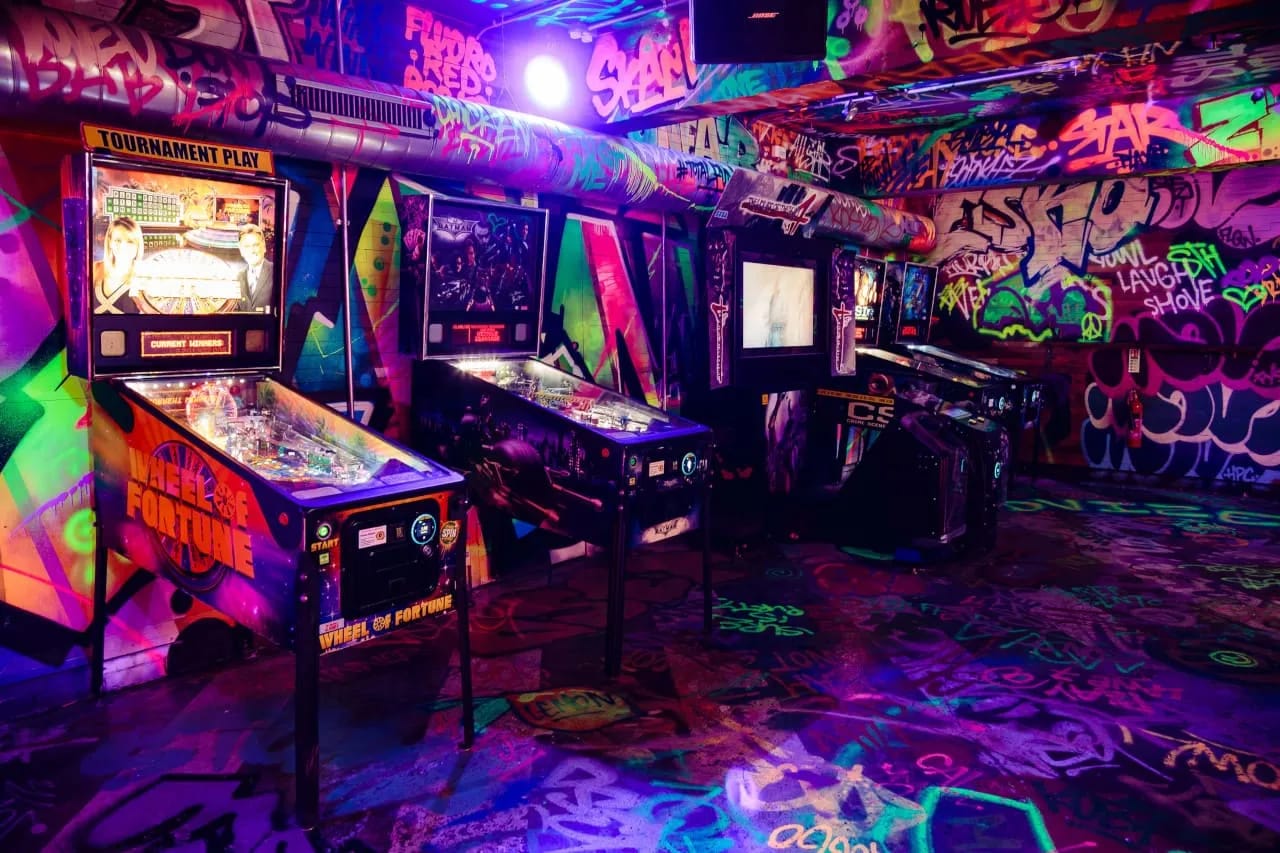 Green Area breakout space at Lane7 Camden with arcade games for corporate reception events.