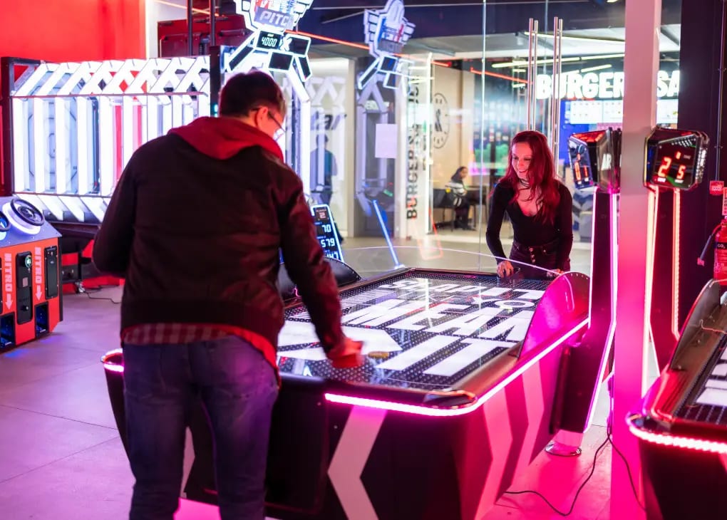 Green Area breakout zone at Lane7 London featuring interactive gaming for corporate events.