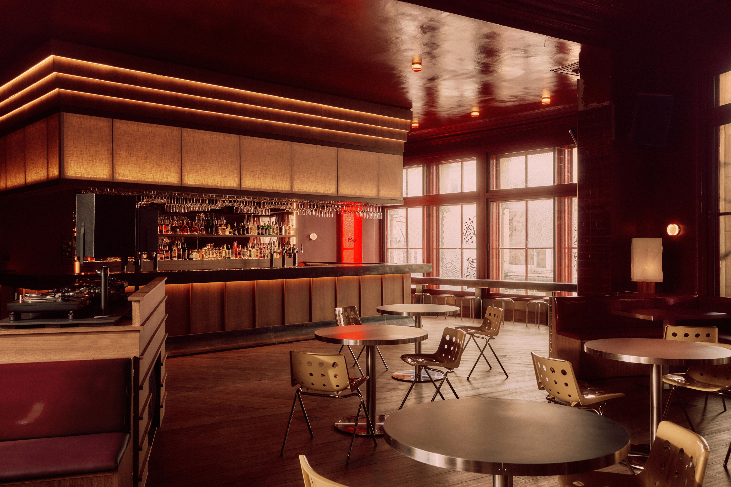 Sophisticated Palais Ballroom with warm lighting for upscale corporate networking and receptions.