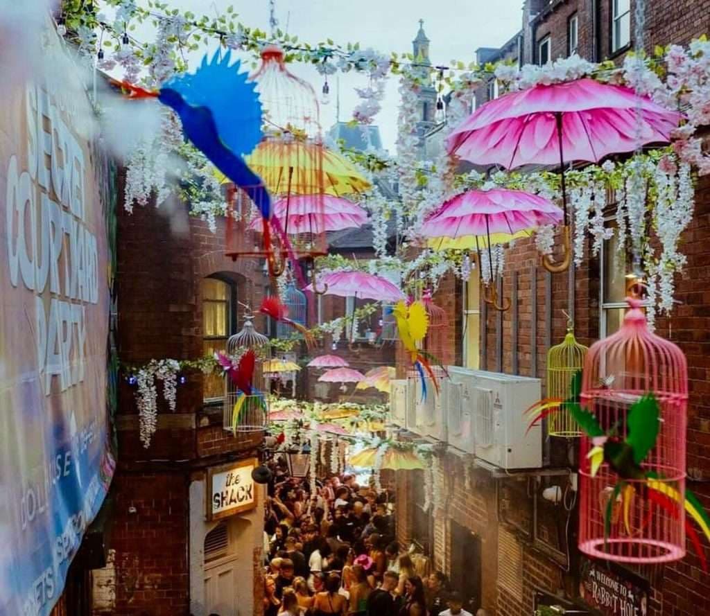 Full venue hire at The End Bar featuring thematic courtyard decor for immersive event hosting.