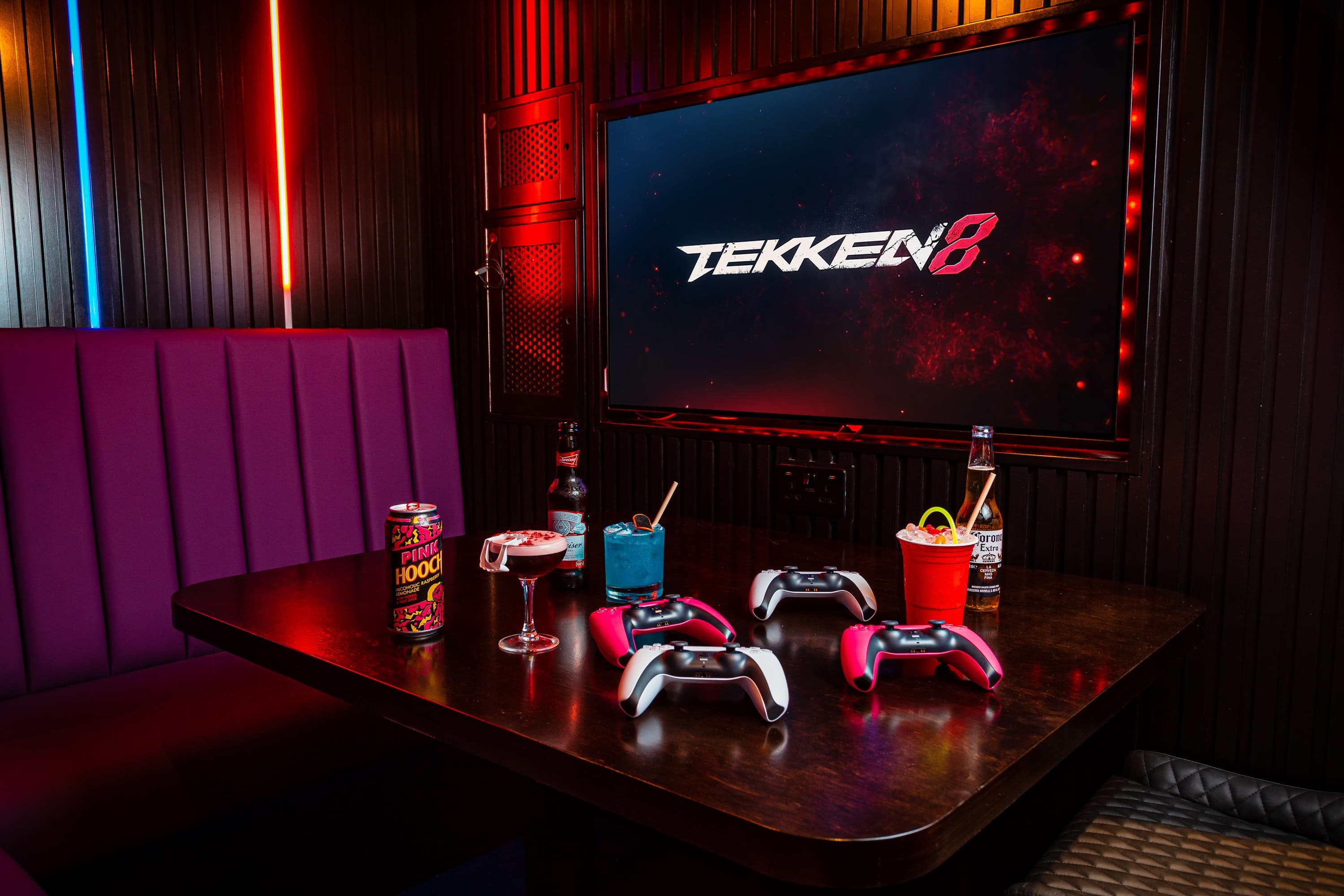 Modern bar venue hire for corporate teambuilding with integrated gaming and AV setup.