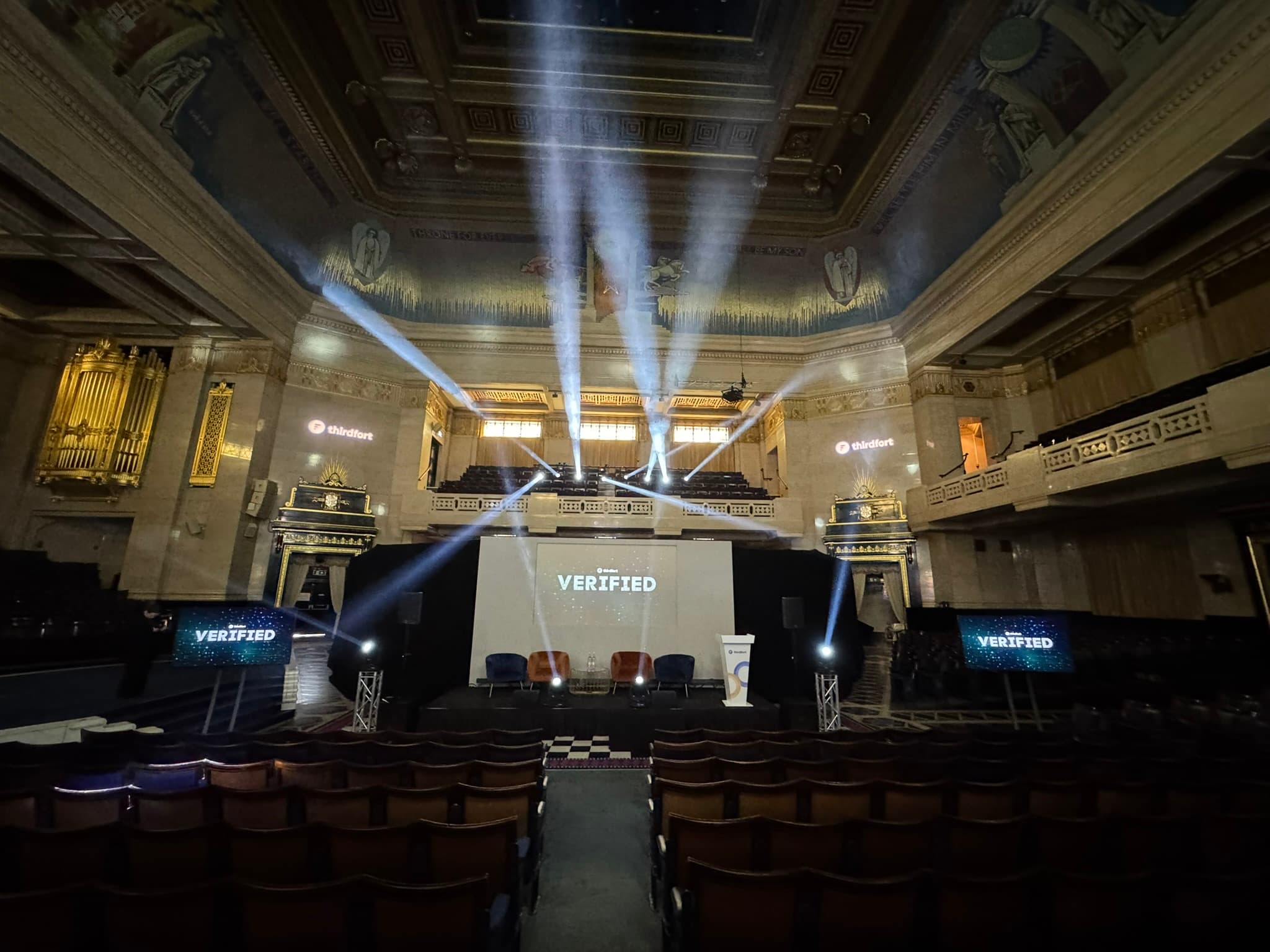 Corporate event at Grand Temple featuring ornate architecture and modern stage lighting.