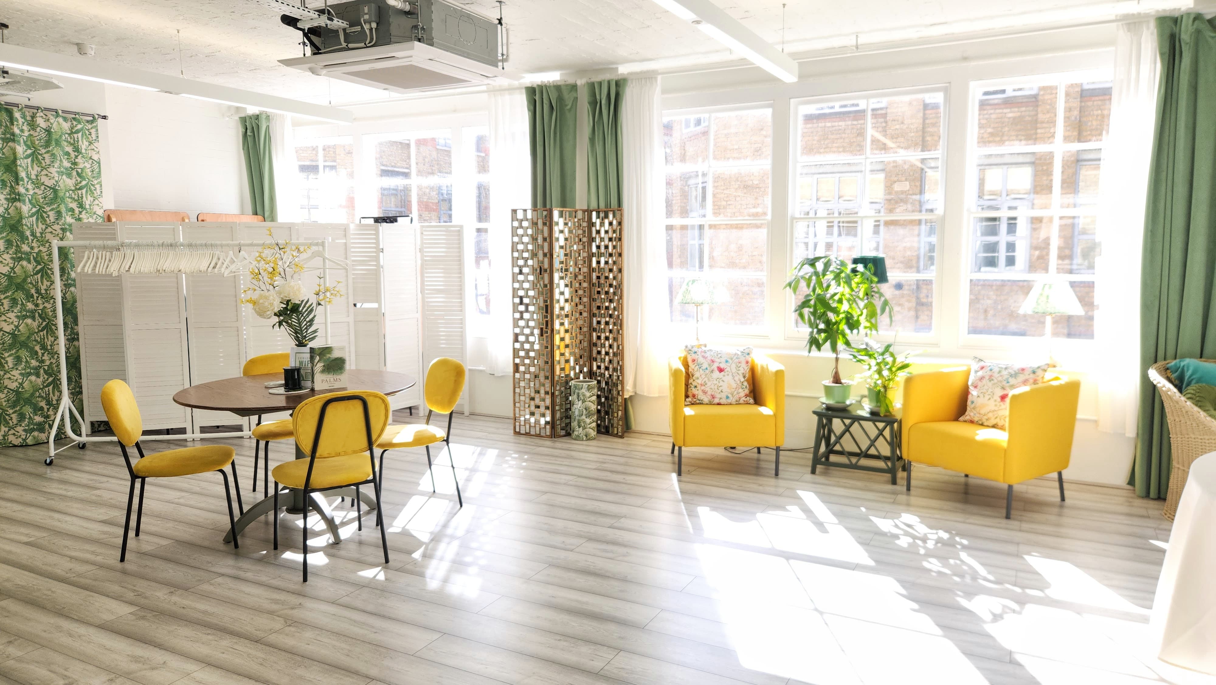 Underwood Lofts and Palm Room breakout space featuring lounge seating for corporate events.