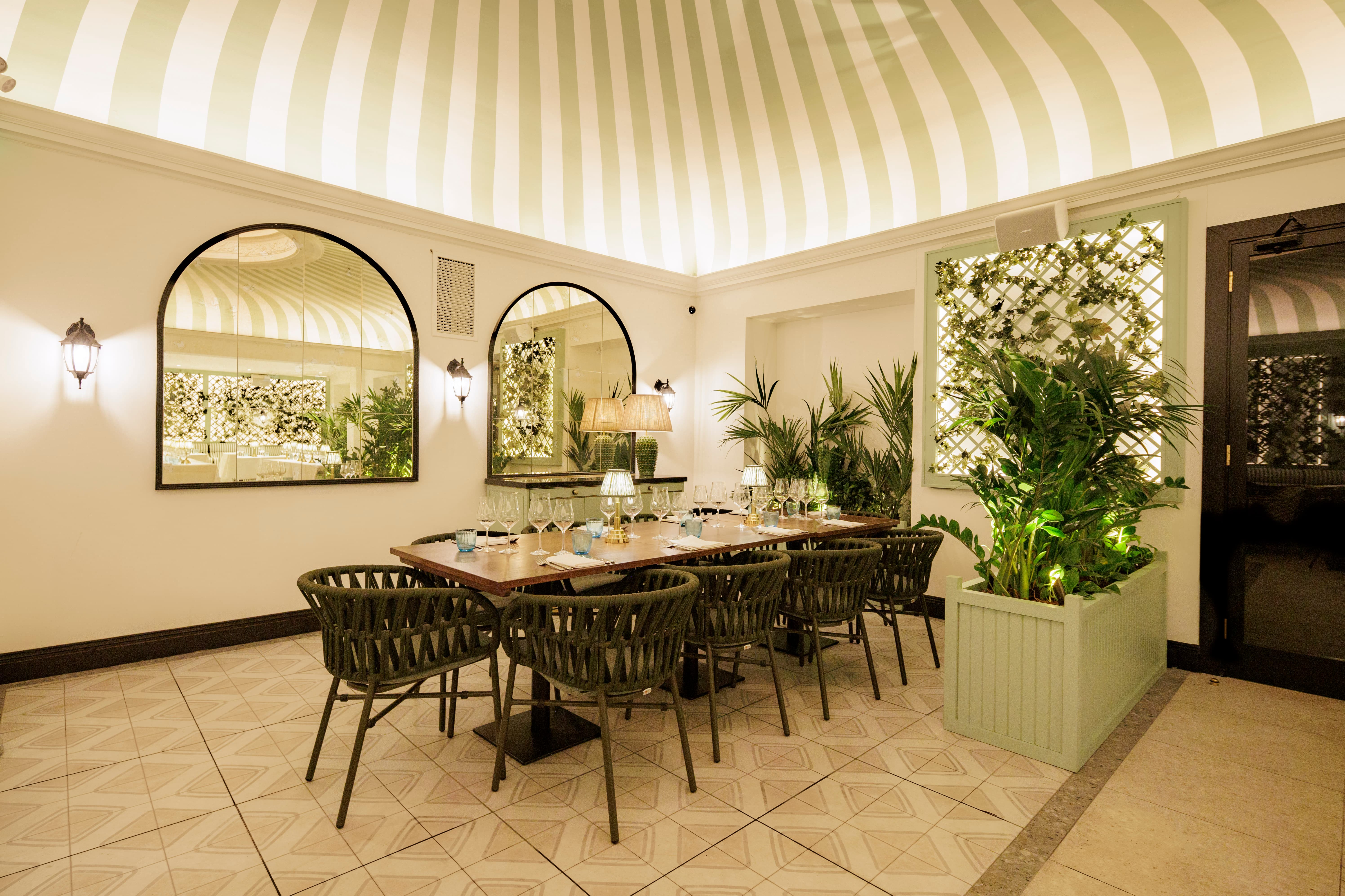 Garden Room at Pillar Hall: chic private dining space for board meetings and networking events.