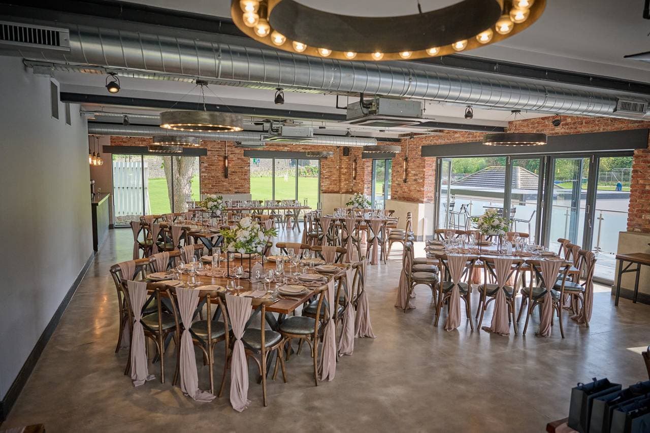 Tollgate Suite at The Hurt Arms: Industrial-chic wedding venue with elegant rustic decor.