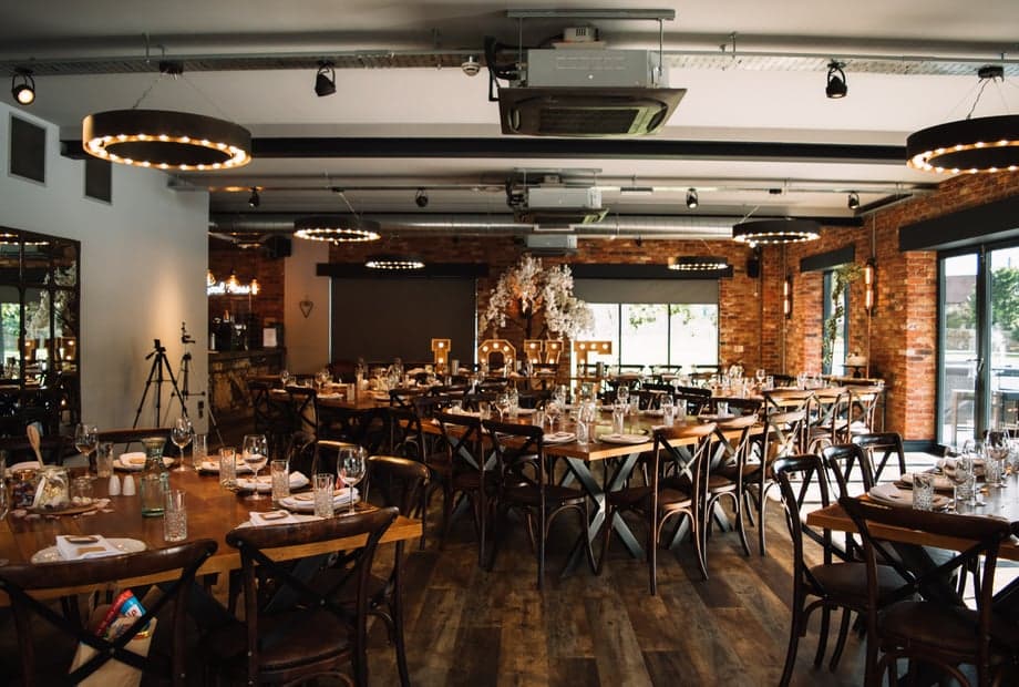 Tollgate Suite at The Hurt Arms: Industrial-chic event venue for weddings and corporate dinners.