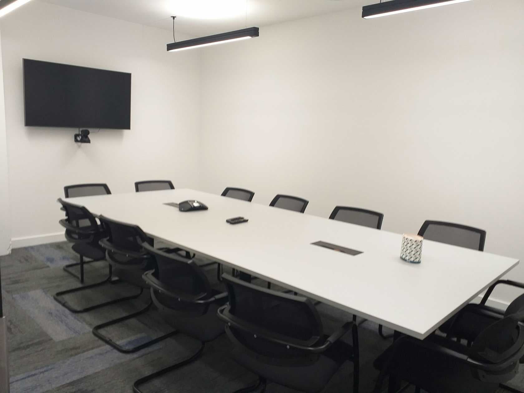 Linder Boardroom meeting space with hybrid tech setup for professional corporate events.