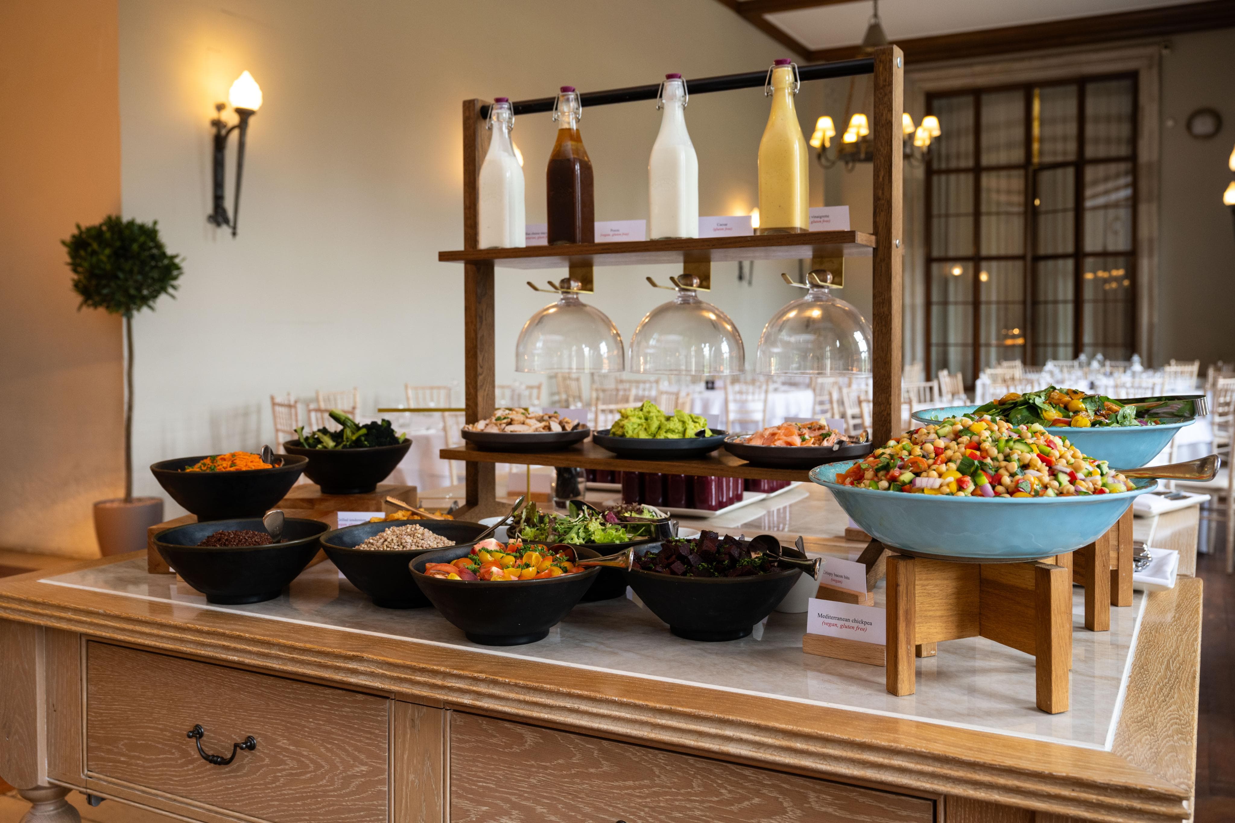 Repton Hall buffet salad station with vertical shelving for catering and corporate events.