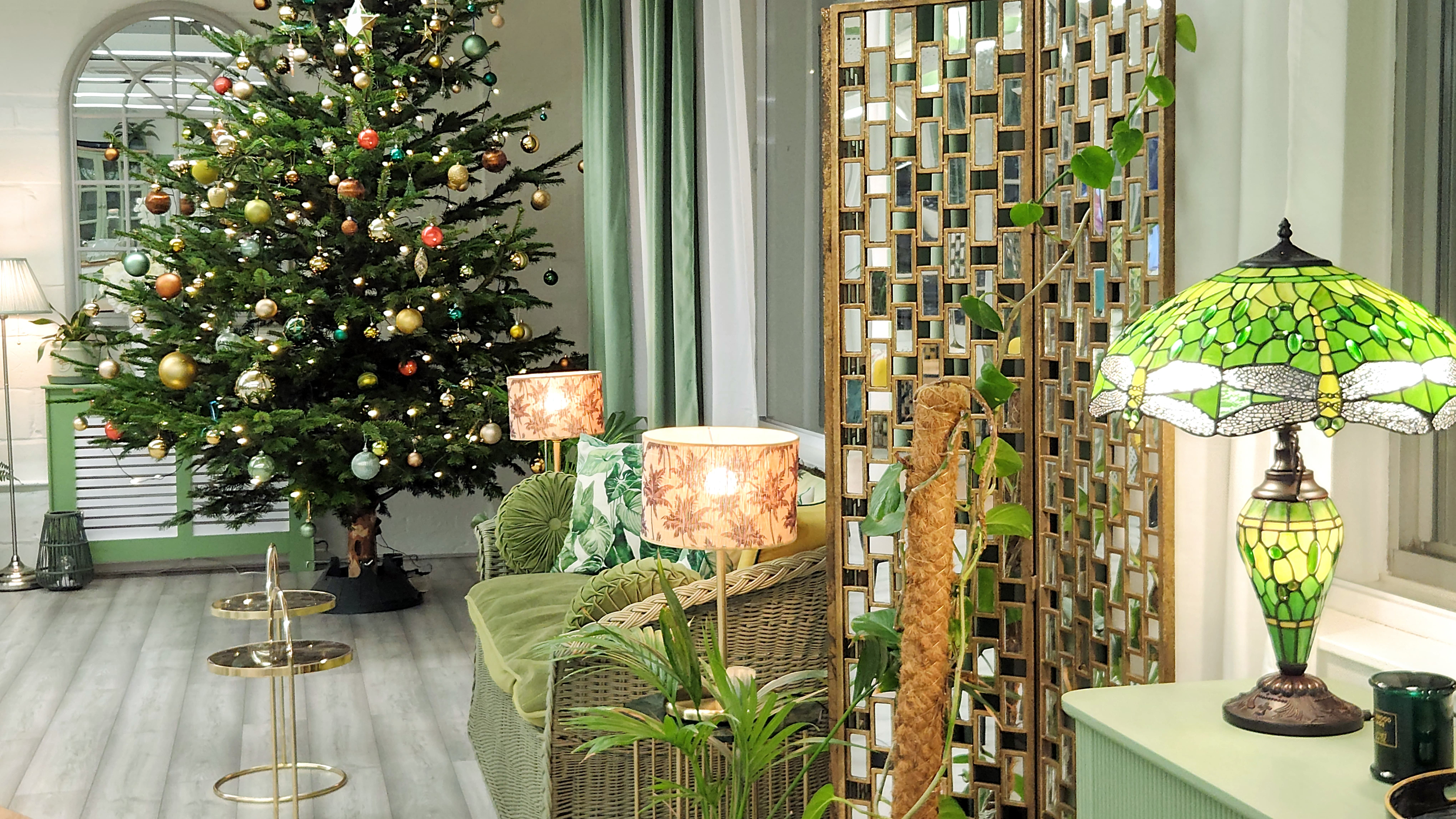 Holiday networking space at Lumiere Underwood with seasonal decor and cozy lounge seating.
