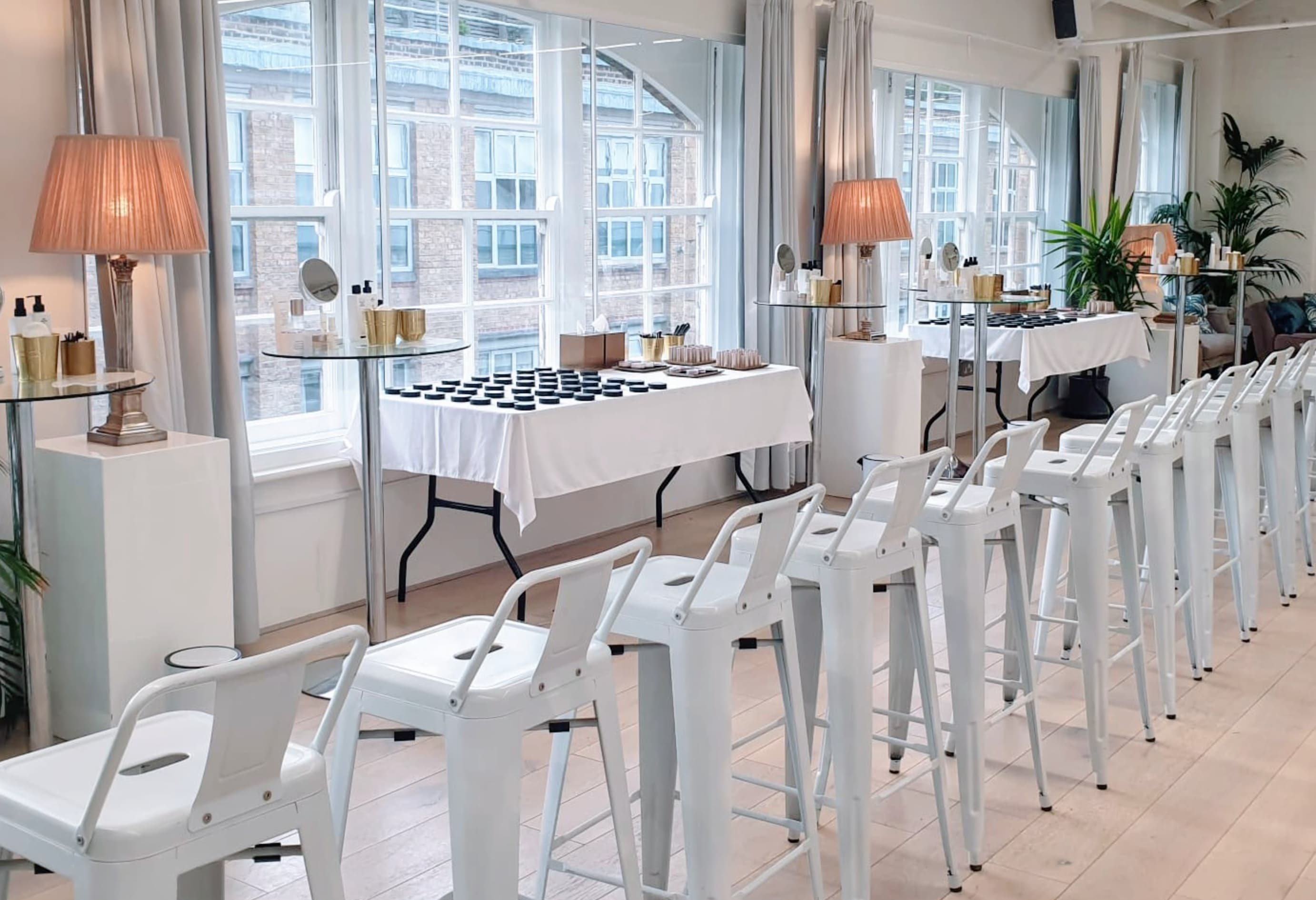 Brand activation workshop with high-top tables at Lumiere Underwood event space.