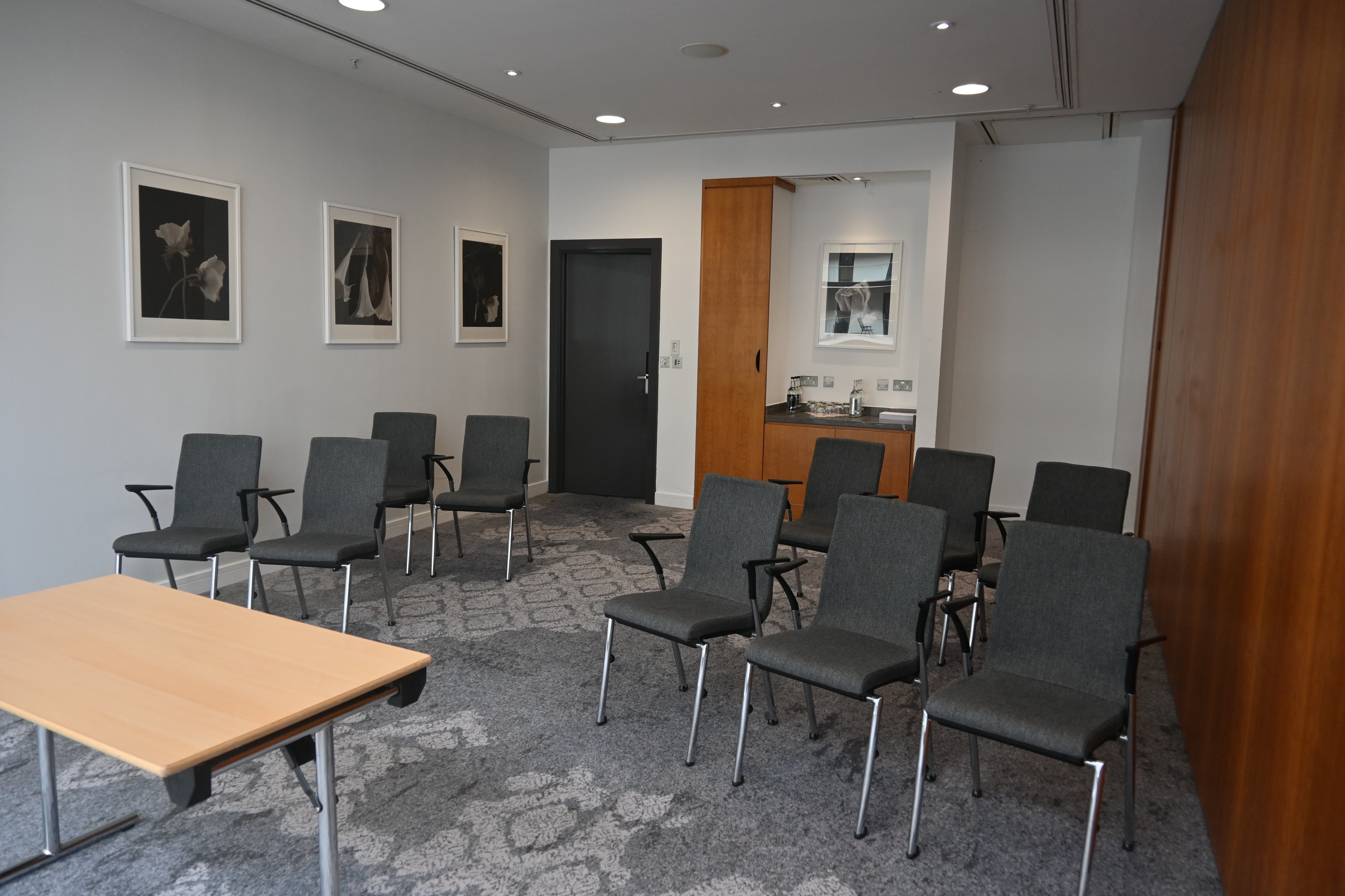 Boardroom-style Meeting Room 2 at The Lowry Hotel for corporate events and presentations.