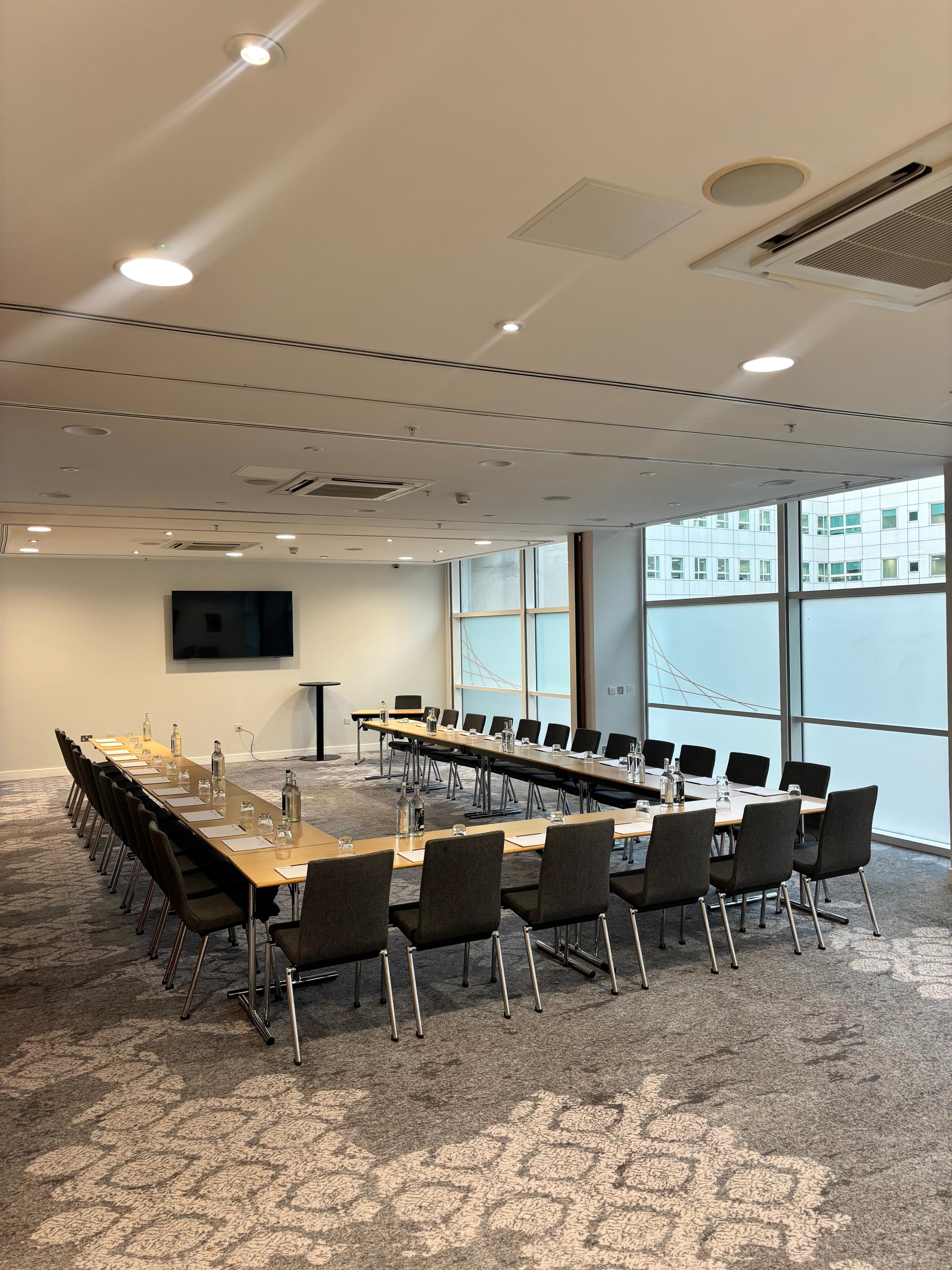 U-shape boardroom at The Lowry Hotel for corporate meetings and workshops.