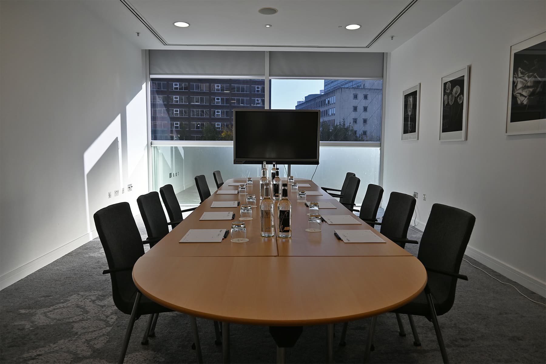 Boardroom setup in The Lowry Hotel Meeting Room 6 for corporate meetings and business conferences.