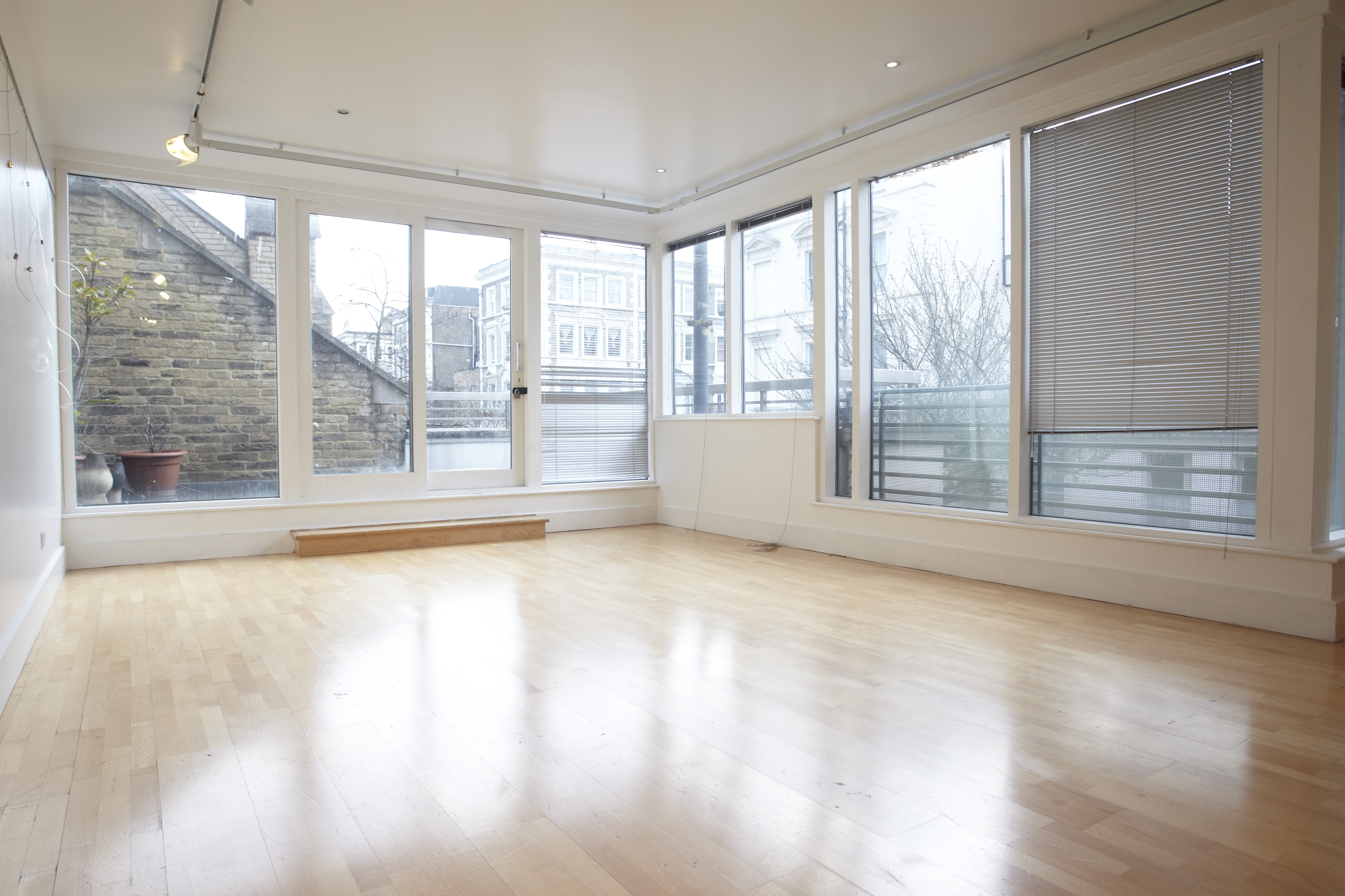 Millennium Art Gallery: bright event space with large windows for workshops and gatherings.