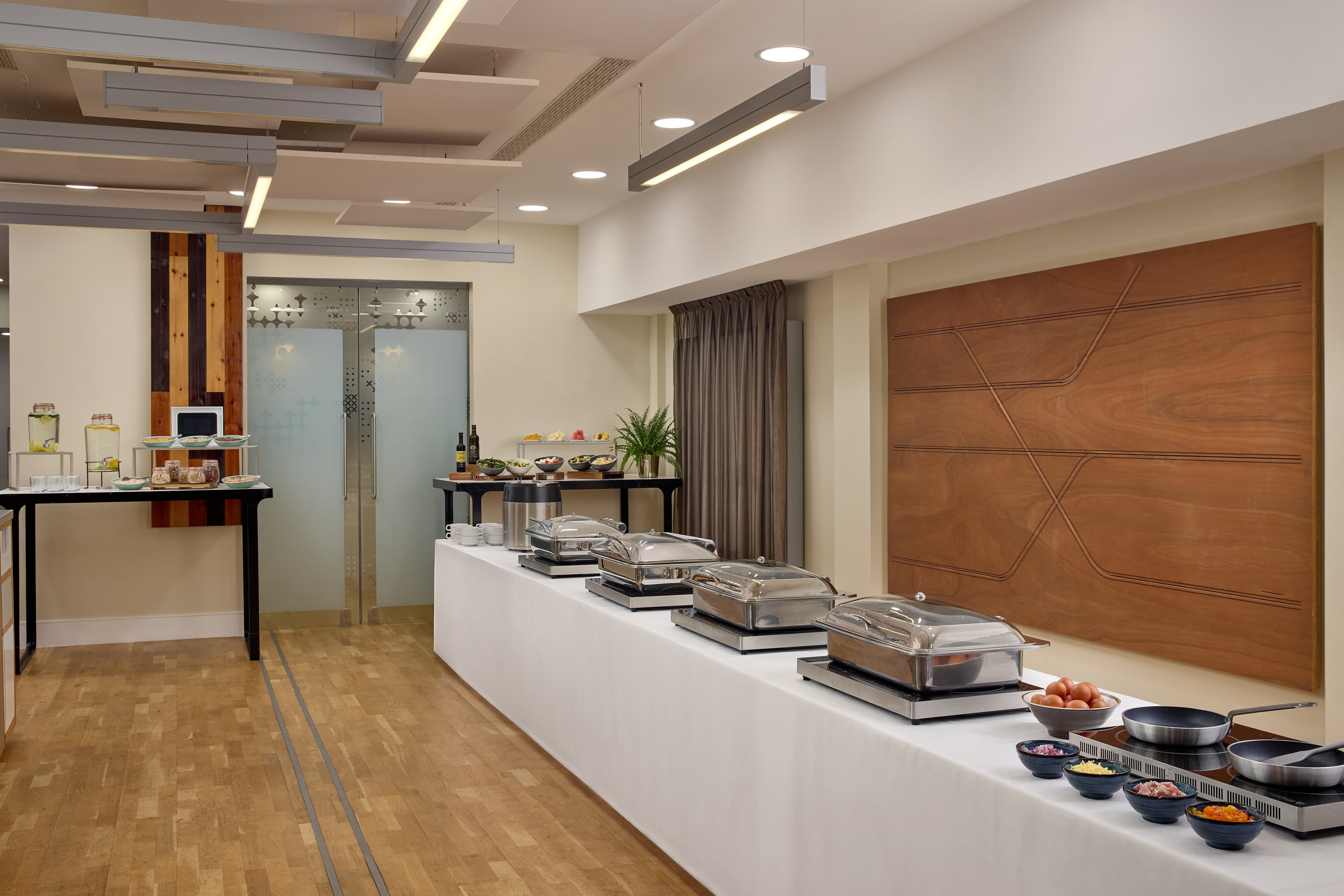 Modern buffet setup in London Marriott Kensington Studio 2 for corporate breakfast or lunch events.