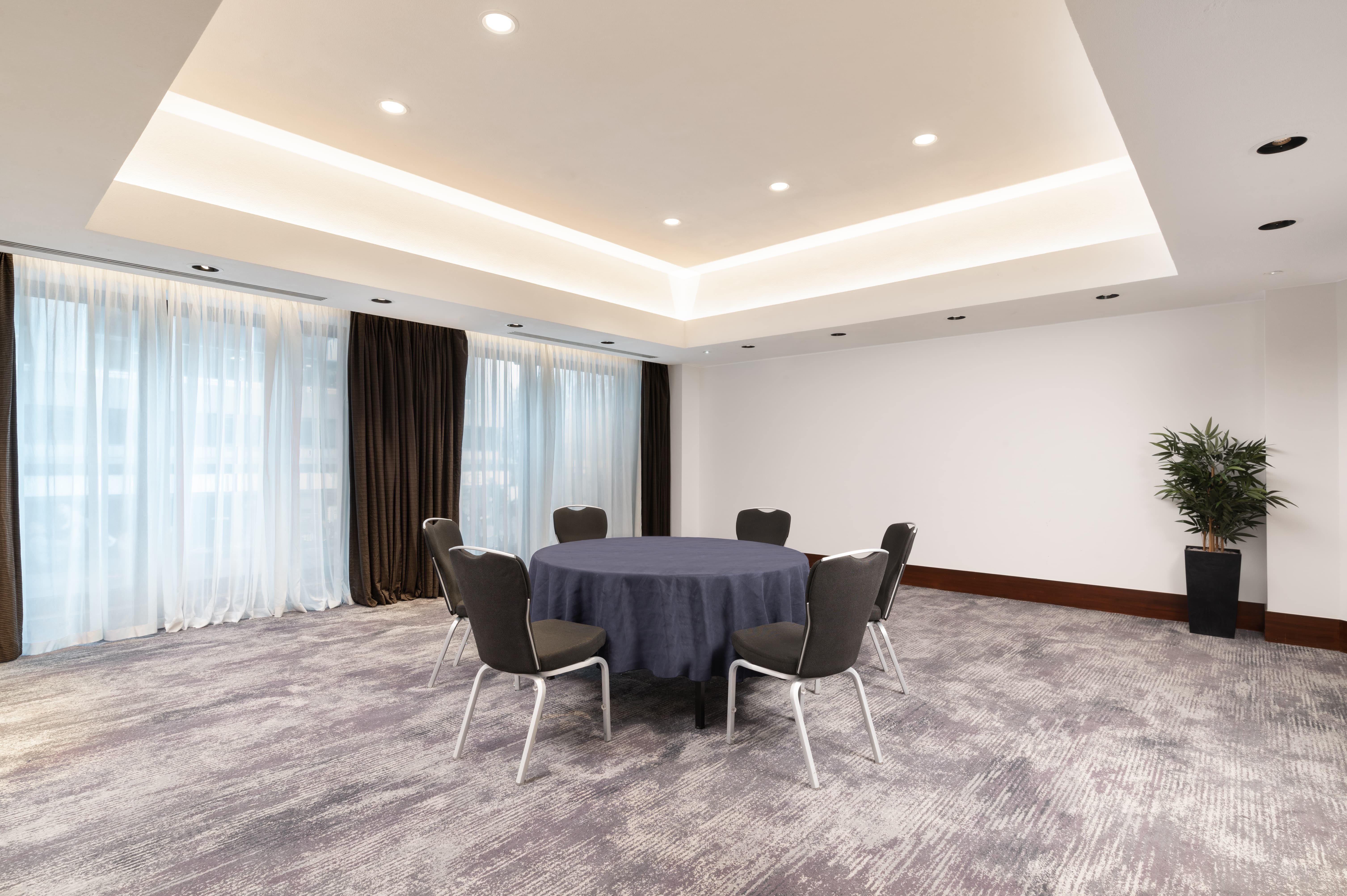 Hilton London Metropole Mezzanine meeting room with natural light for board meetings and events.