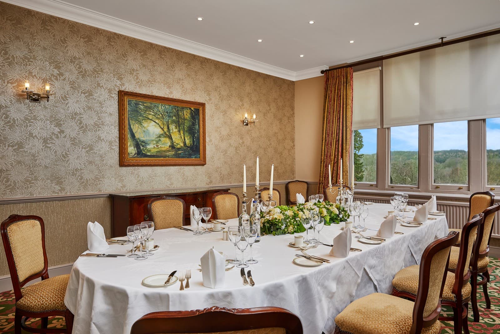 Formal private dining room at Ashdown Park Hotel for business networking luncheons.