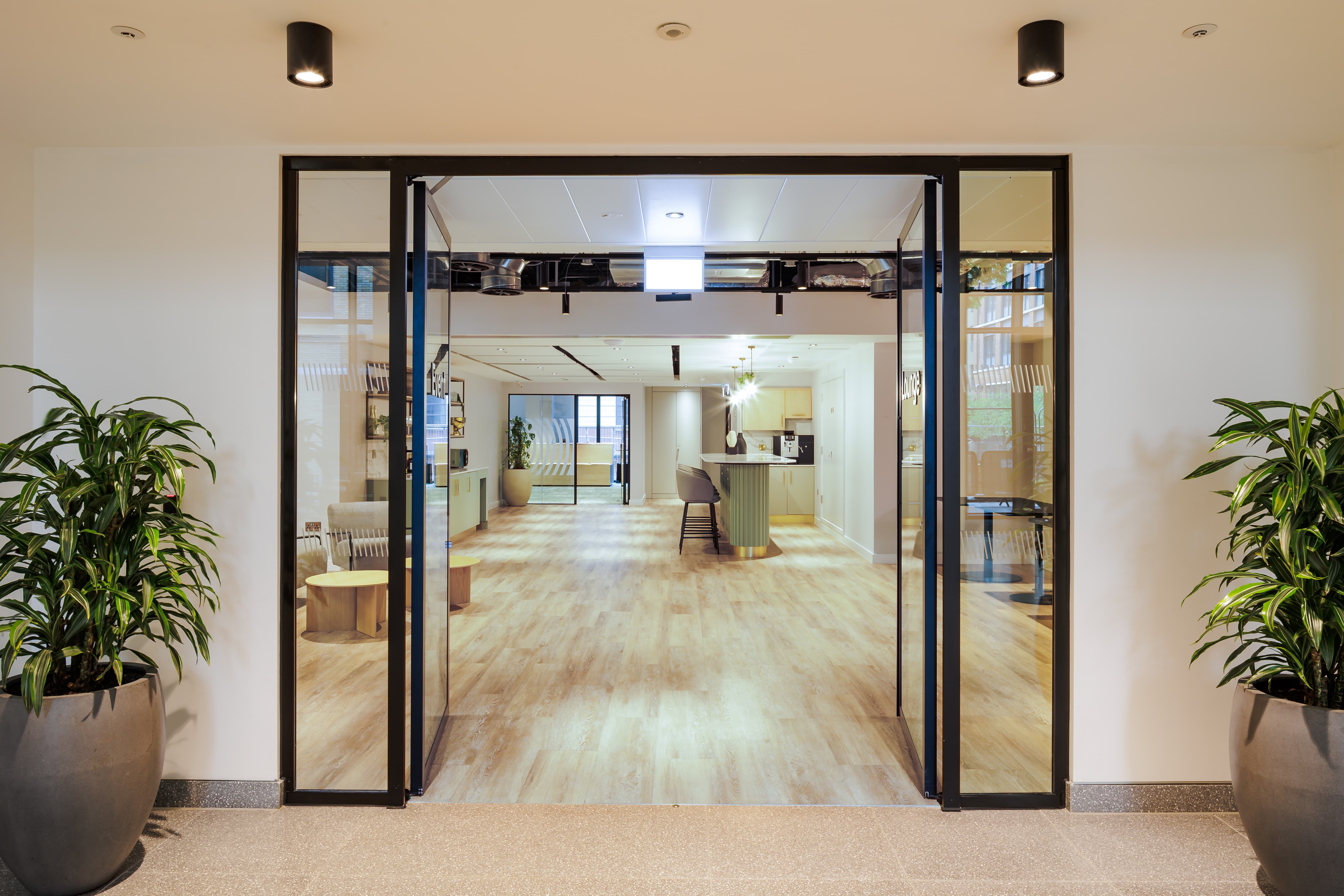 Modern 10X Lounge breakout space, open-plan interior for networking and cocktail events.