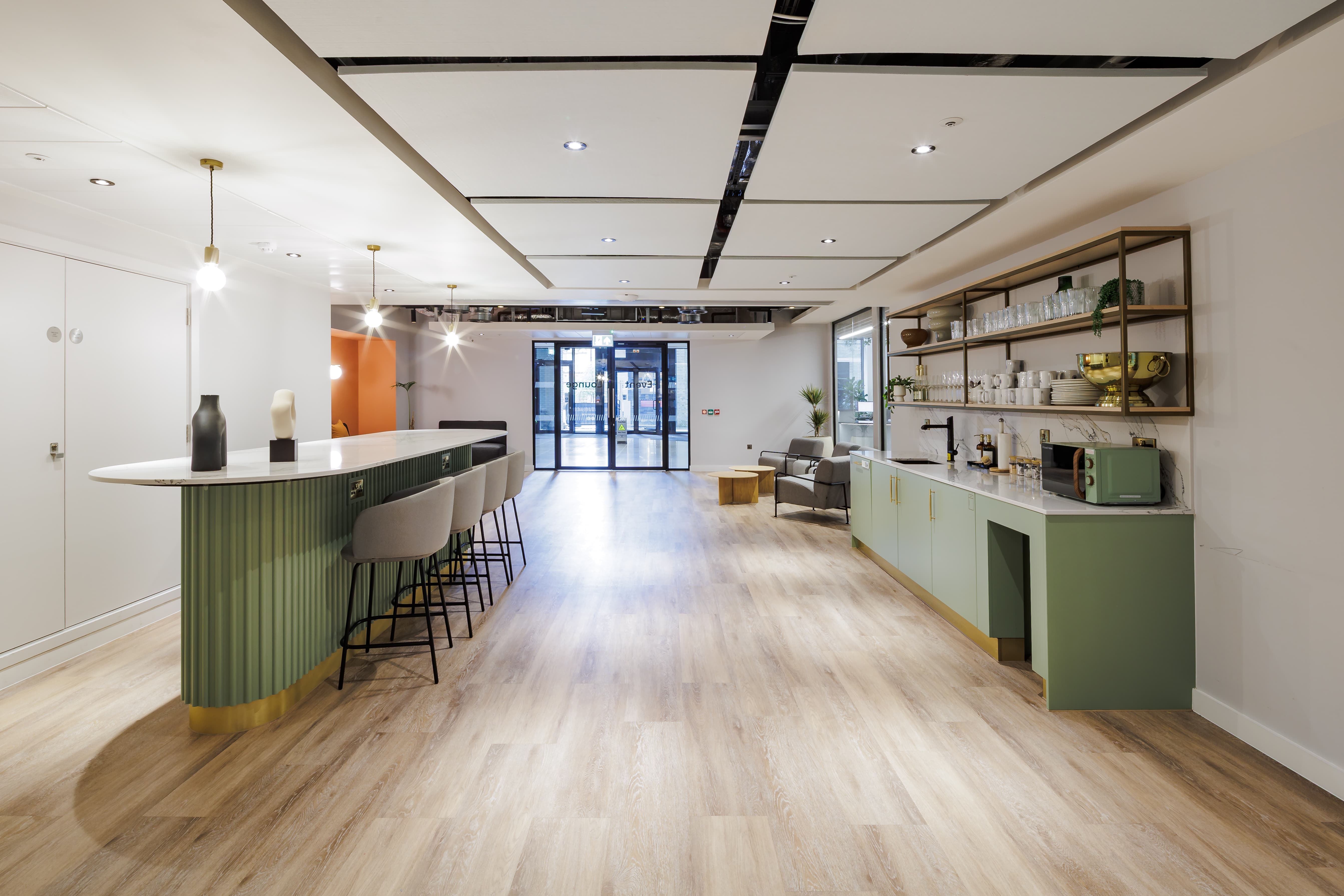 10X Lounge modern breakout space for corporate networking and event catering.