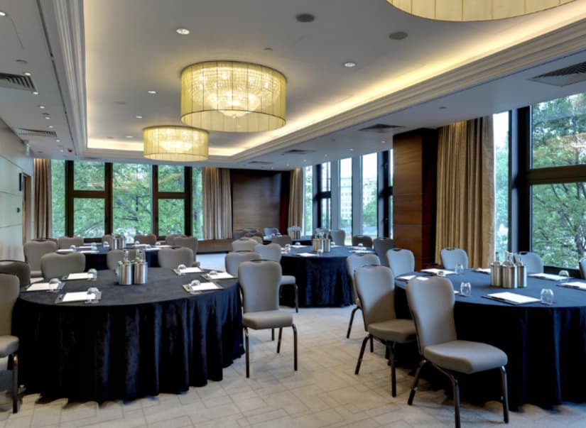 Corporate banquet setup with black linens at InterContinental London Park Lane for workshops.