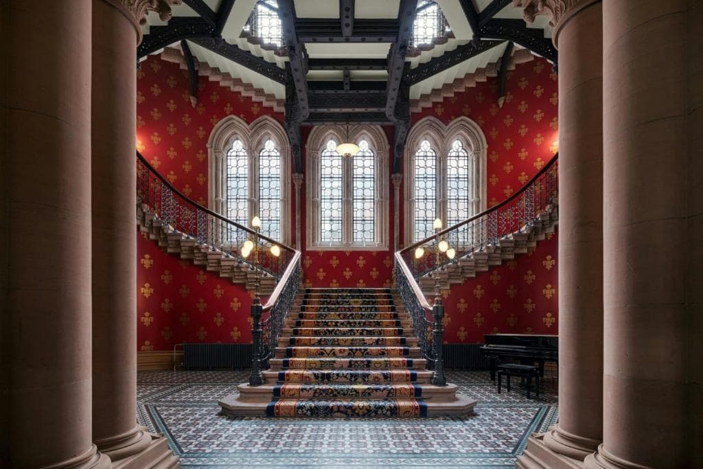 St. Pancras meeting space with symmetrical grand staircase for events and brand photography.