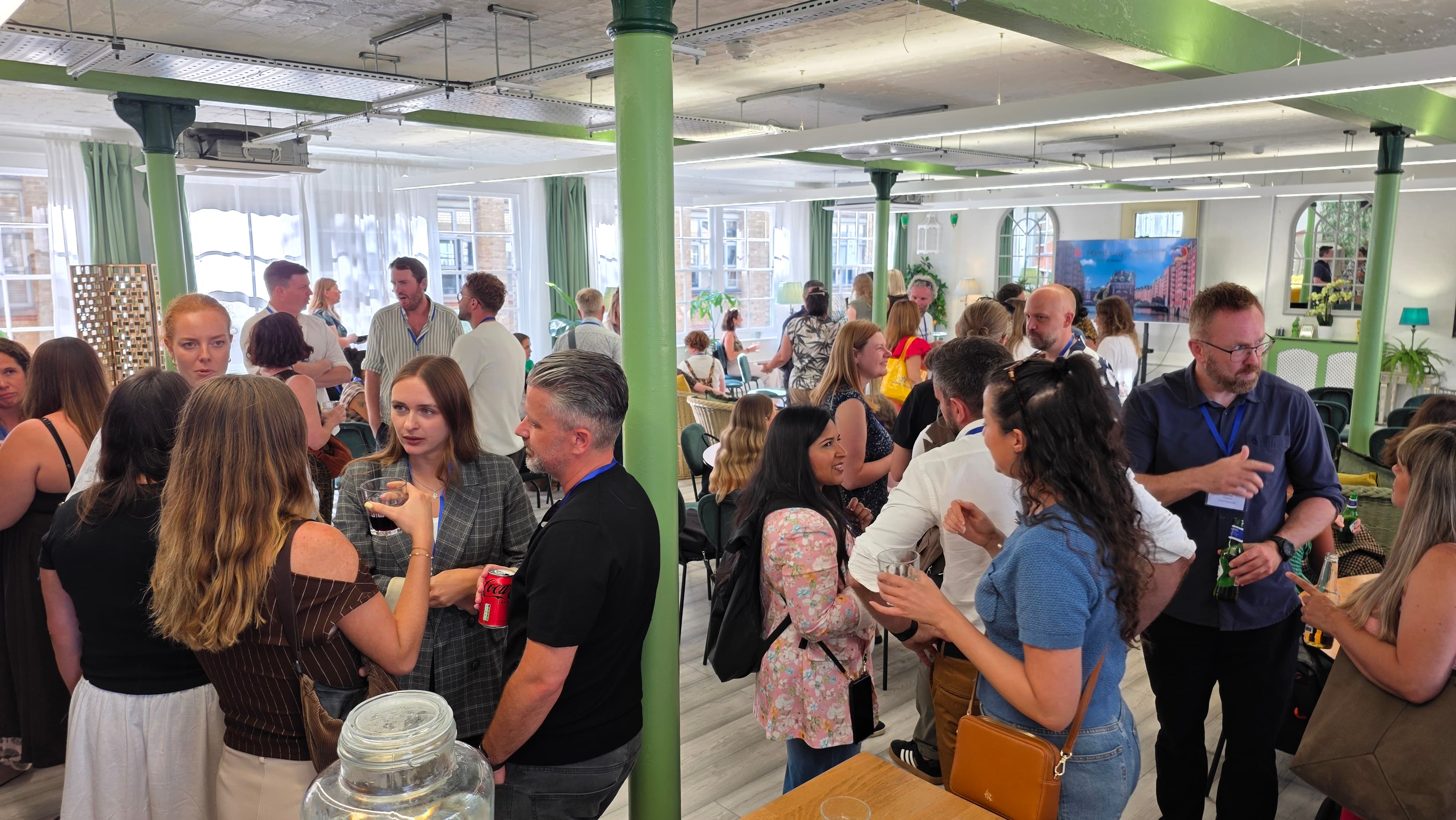 Corporate networking reception at industrial-chic Lumiere Underwood event space.