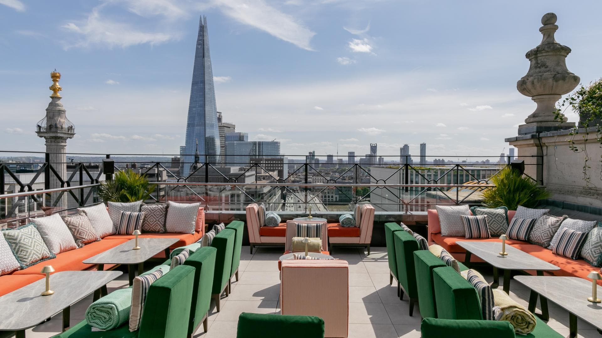 Luxury rooftop event venue in London with Shard backdrop for corporate cocktail networking.