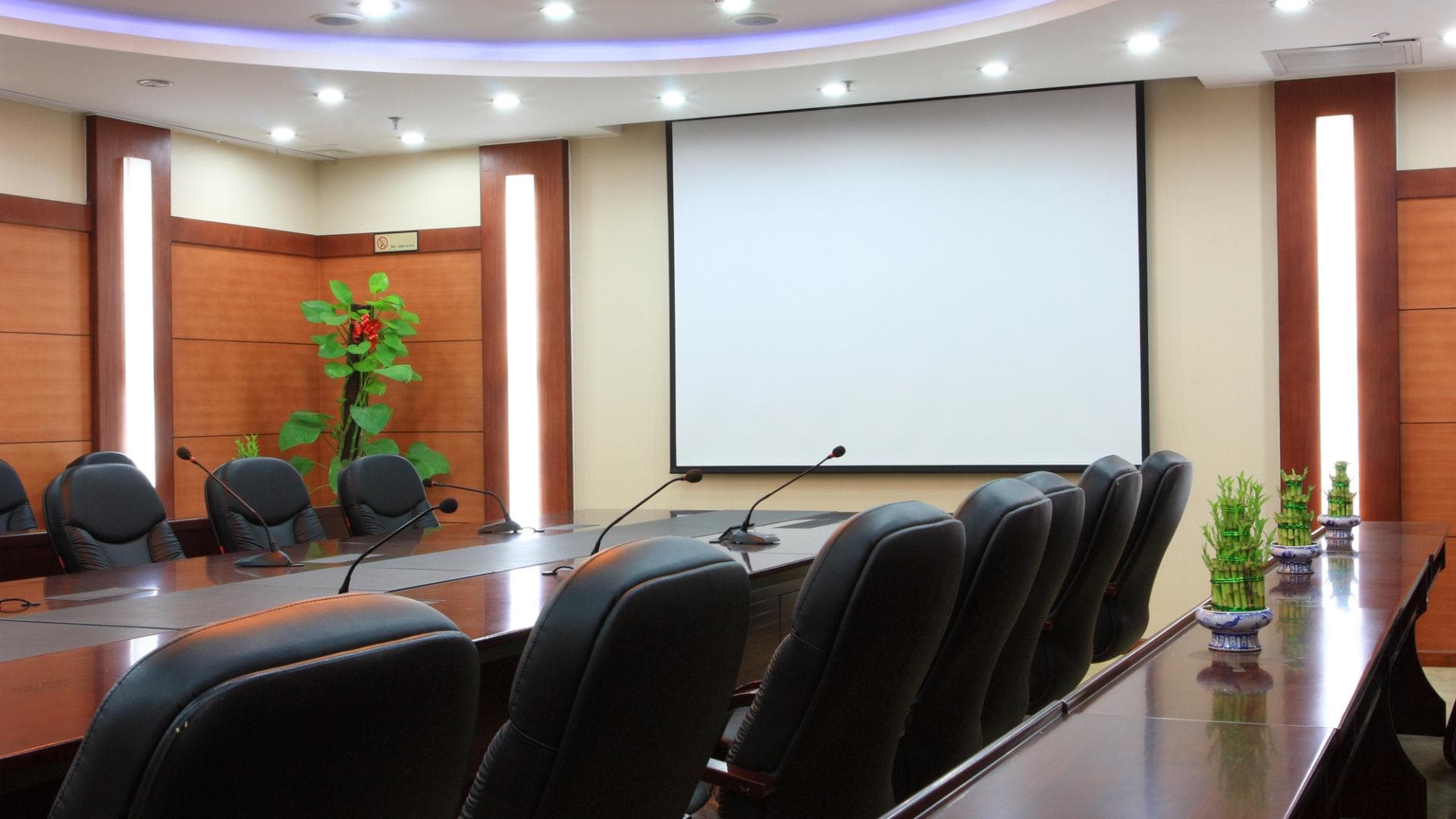 The Playroom boardroom with U-shaped seating for executive meetings and video conferences.
